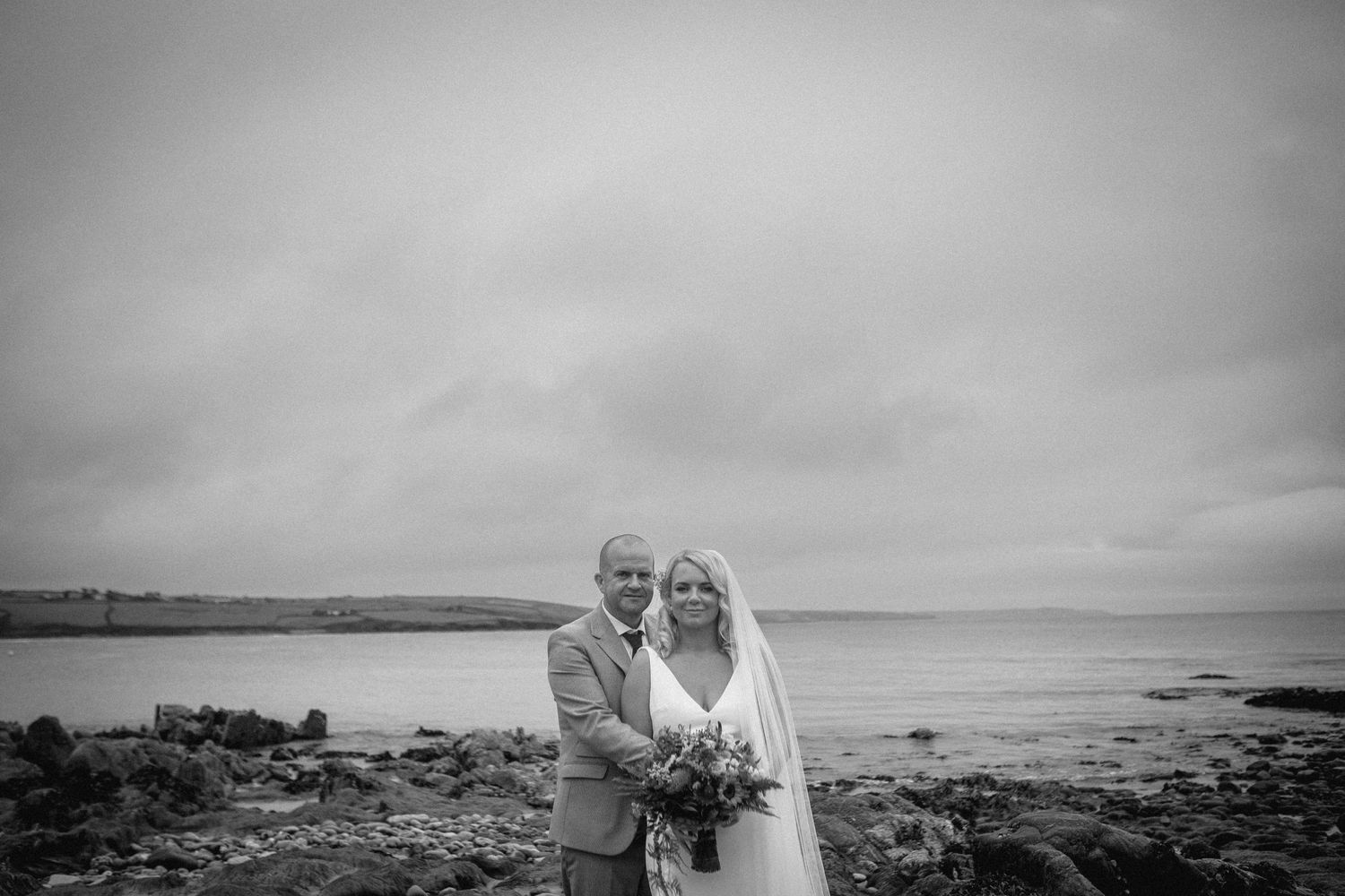 Wedding couple at Dunmore House on the beach