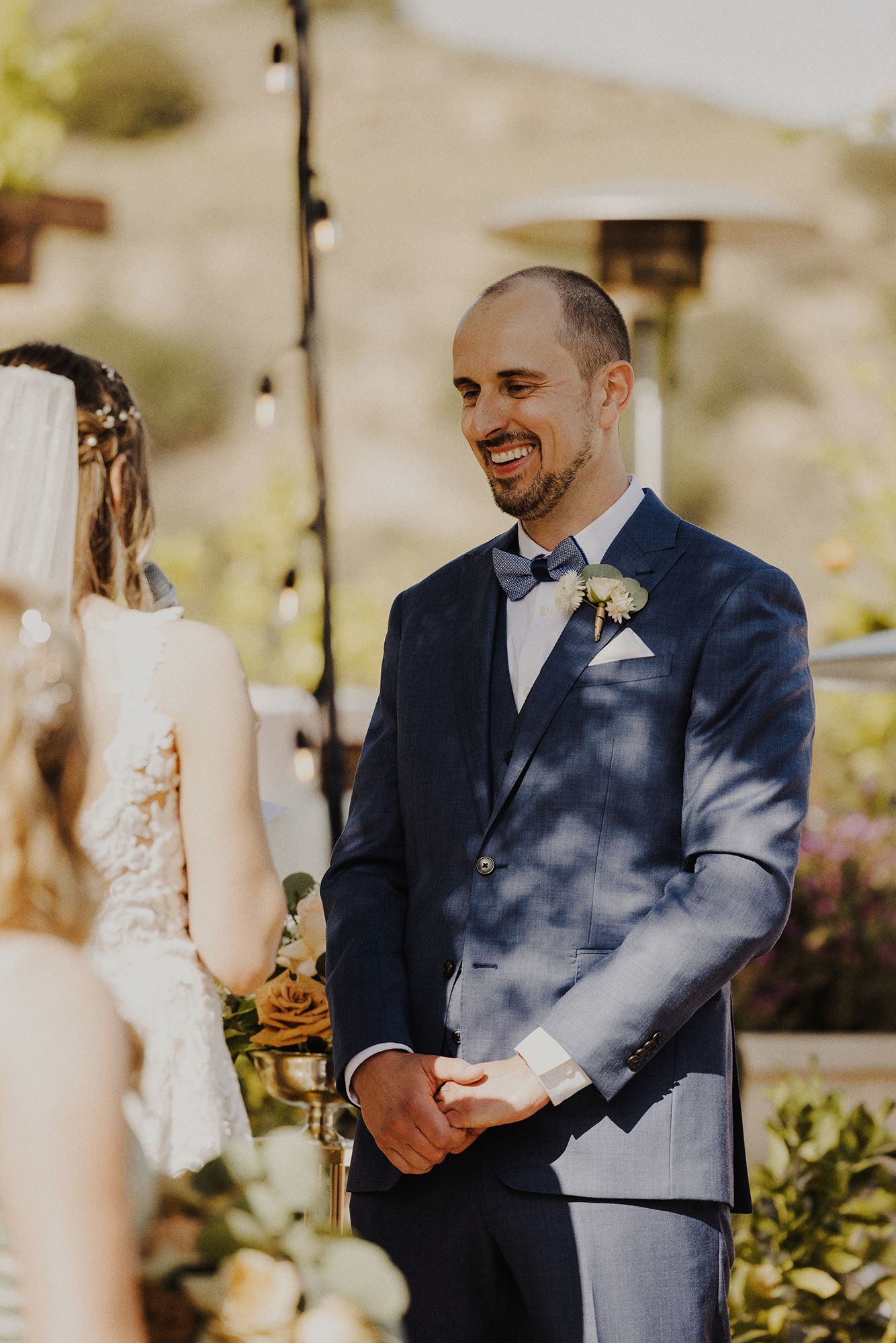 E Noelle Photography backyard wedding in Hidden Hills Los Angeles, bride and groom at alter