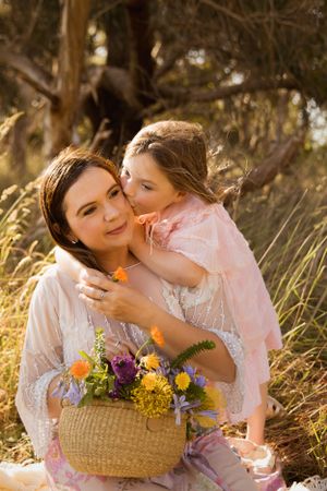 Mummy and me photoshoot. mother's day mini photoshoot, cute floral basket. photoshoot inspo boho