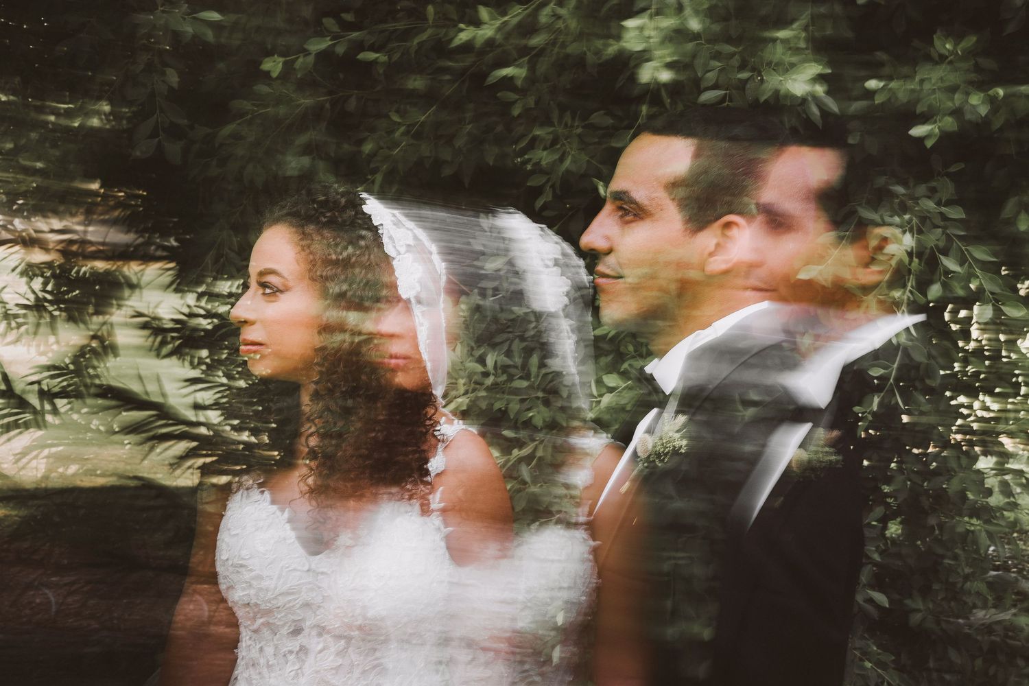 Multiple exposure artistic wedding portrait in forest setting.