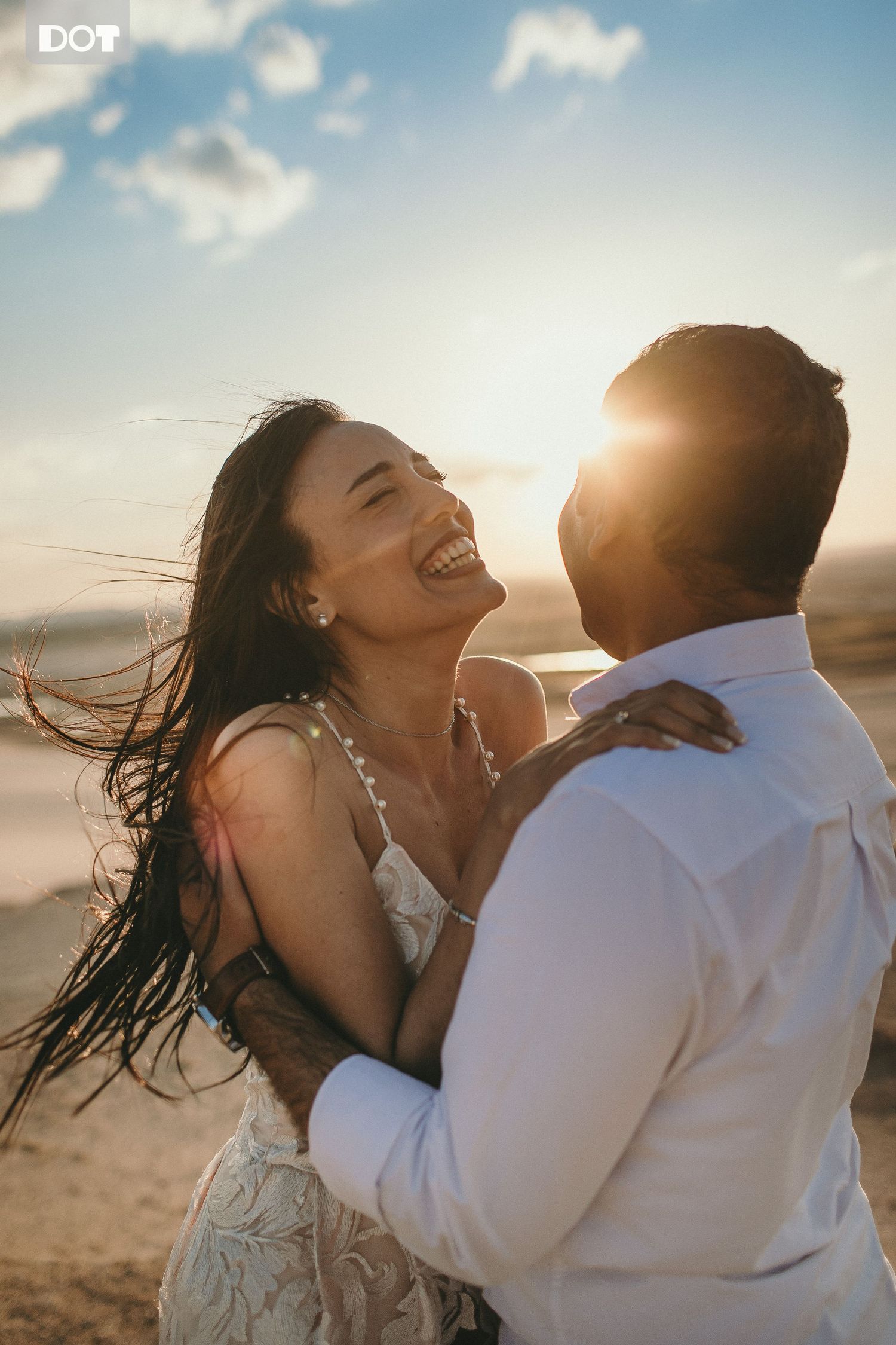 Joyful beach wedding photos with golden sunlight and ocean breeze.
