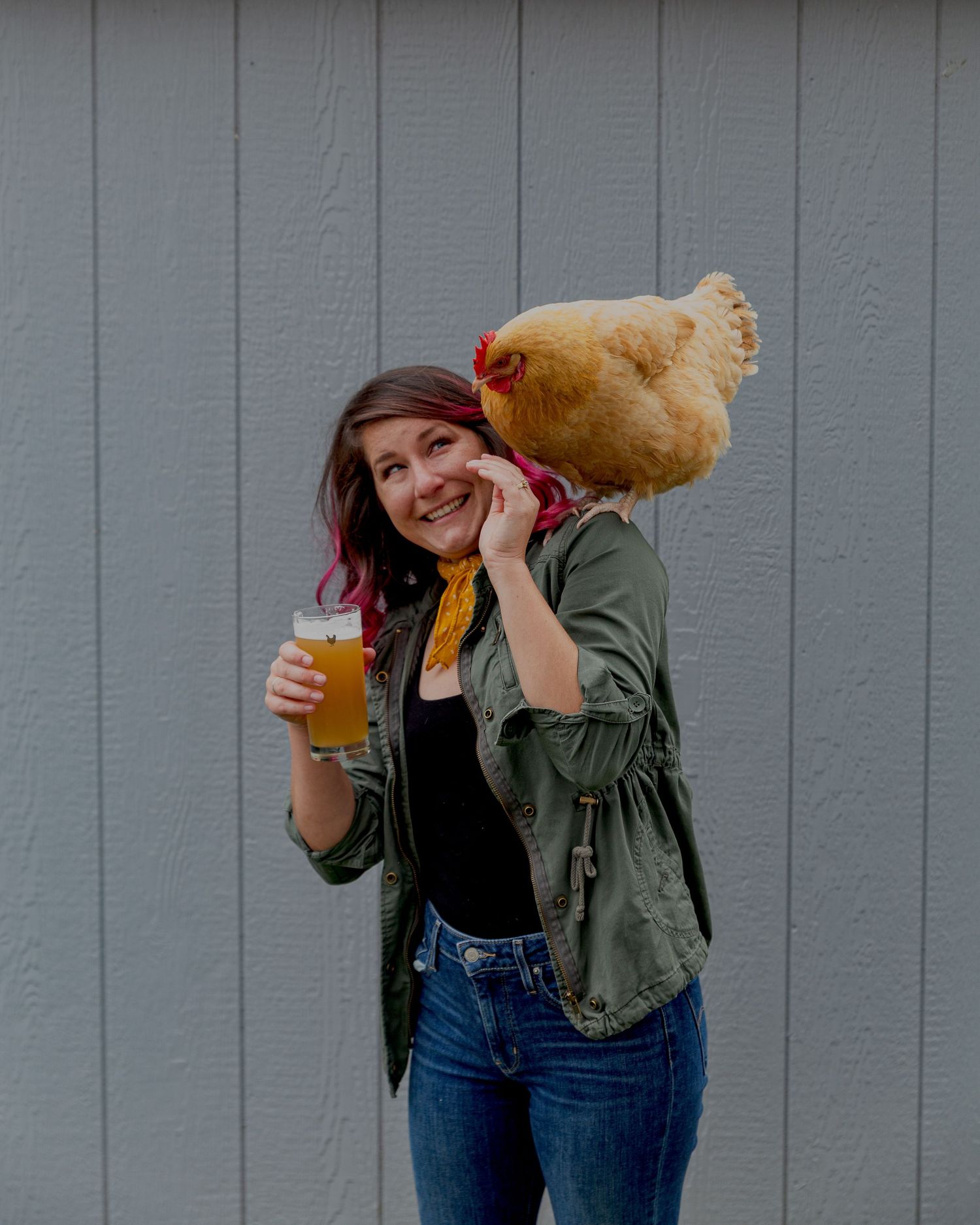 A wine photographer & social media consultant enjoying a beer with a chicken