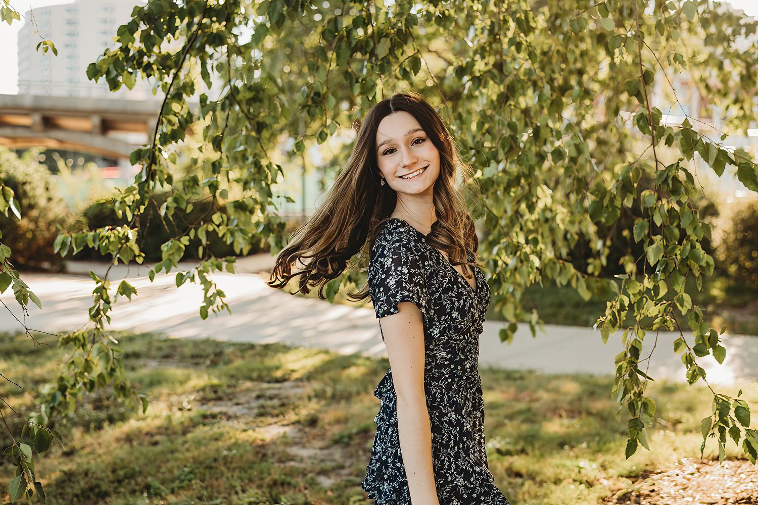Natural light portrait series under green tree canopy in summer.