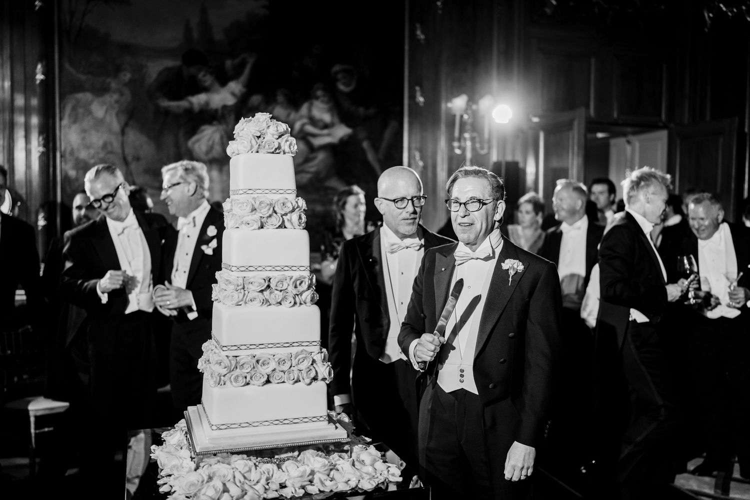 Cutting cake at Claridges Hotel wedding