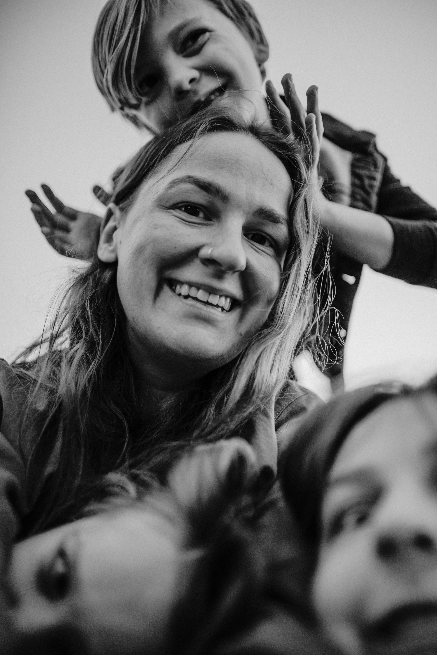 Kimberly Marie Kimble with 3 children playing on them family photographer portland oregon