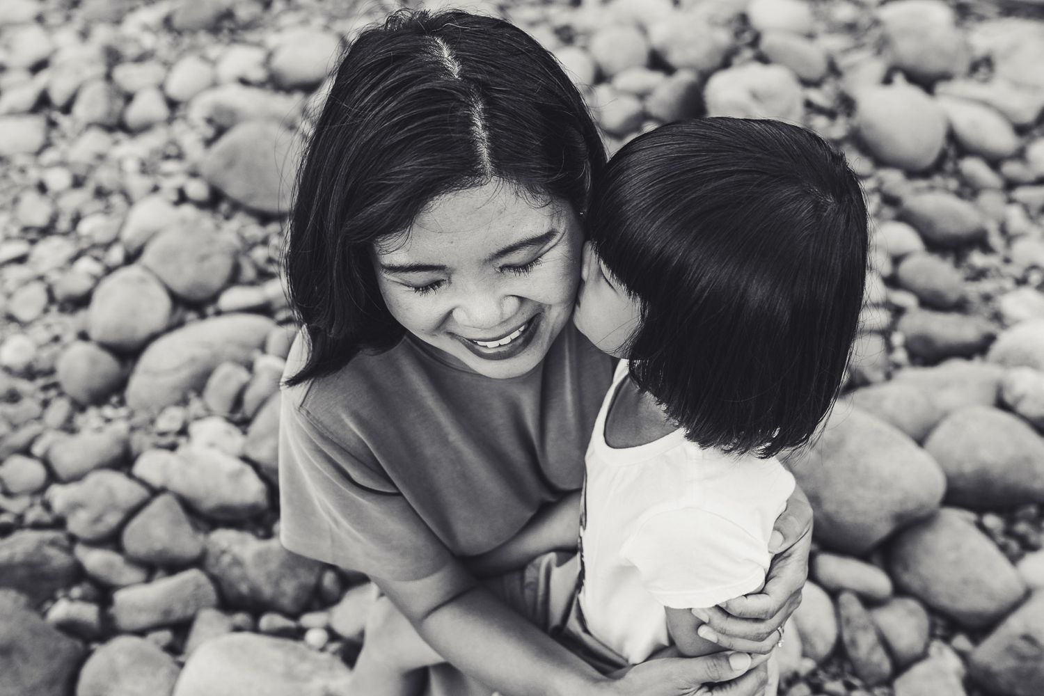 A daughter kissing her mother in Tolt McDonald Park