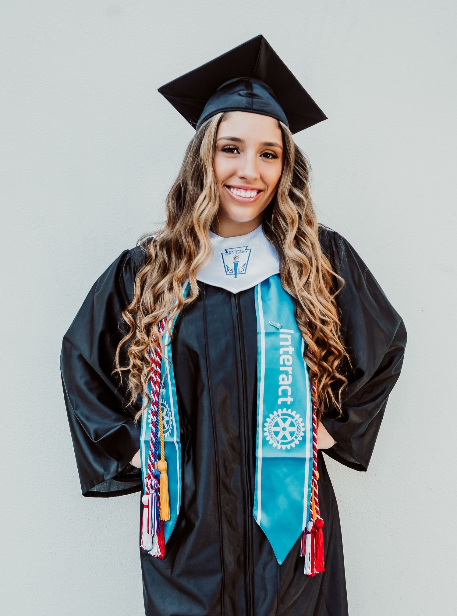 Outdoor Senior Portrait Session Downtown St. Pete, FL; Senior photos, teen posing with cap and gown