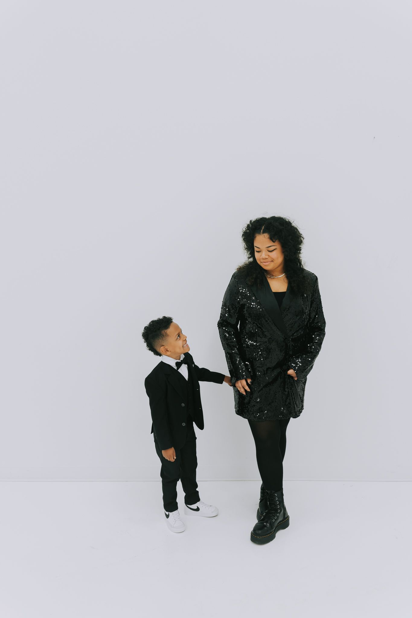 brother and sister holding hands for family photos in dallas texas taken by, alex marie photography.