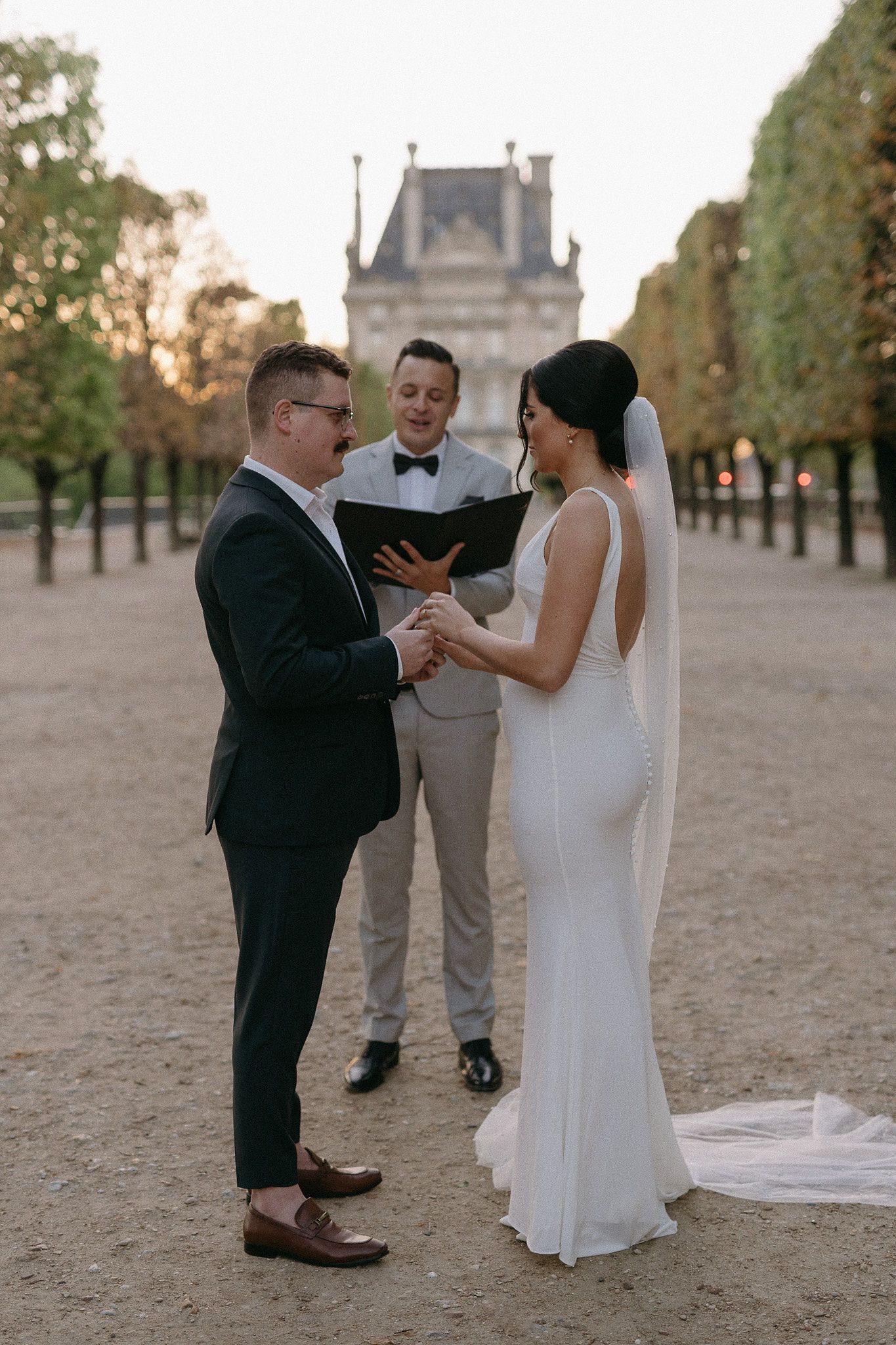 Couple exchanging vows during their elopement in Paris