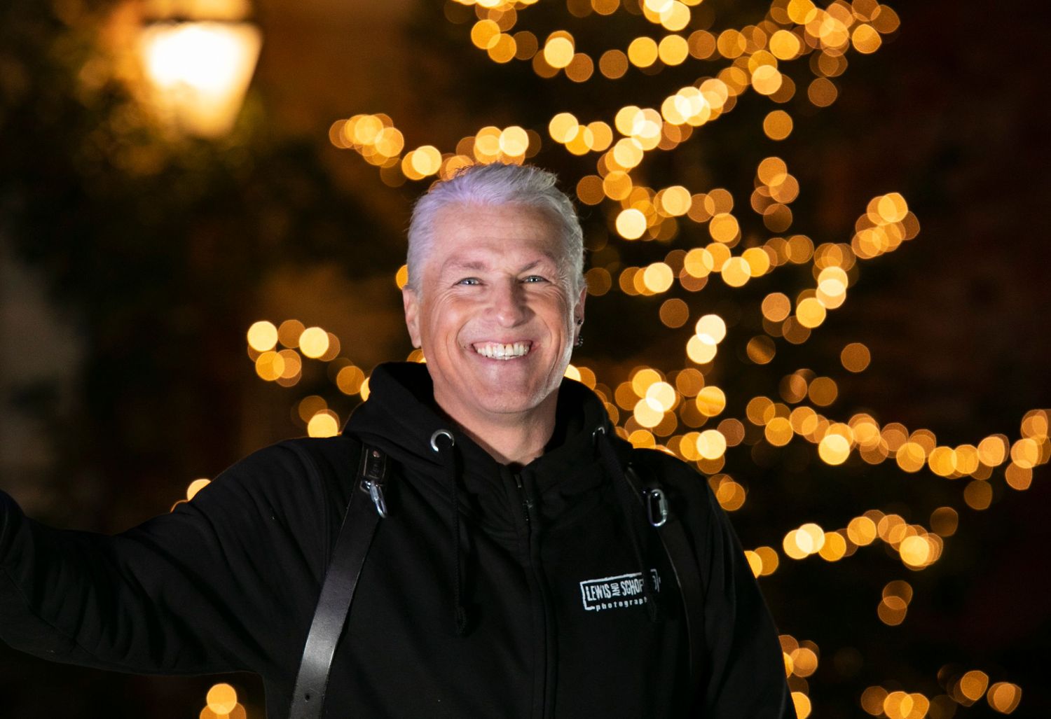 Nighttime portraits with warm bokeh lights creating a magical atmosphere.
