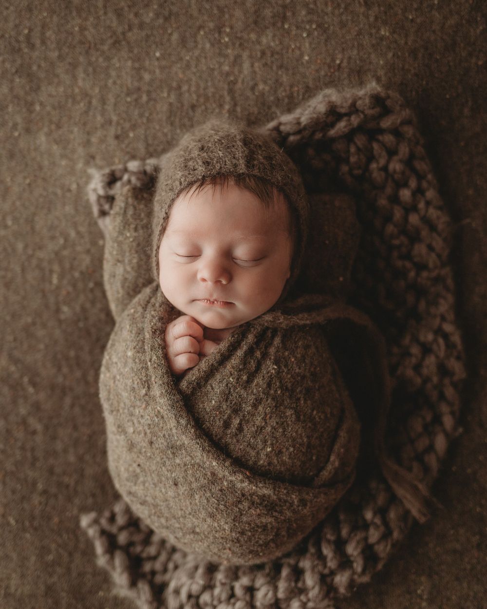 newborn baby mossy green swaddle