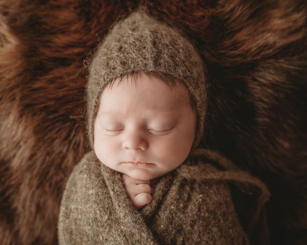 newborn baby mossy green swaddle