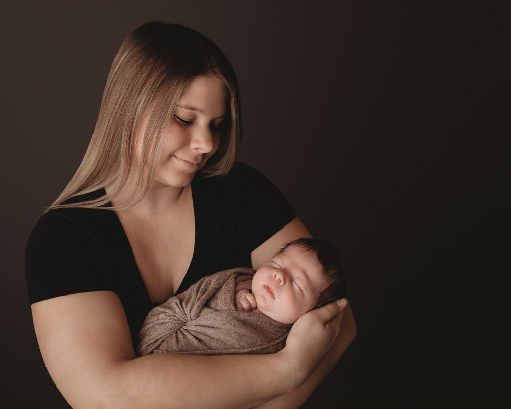 Professional newborn photo with mom