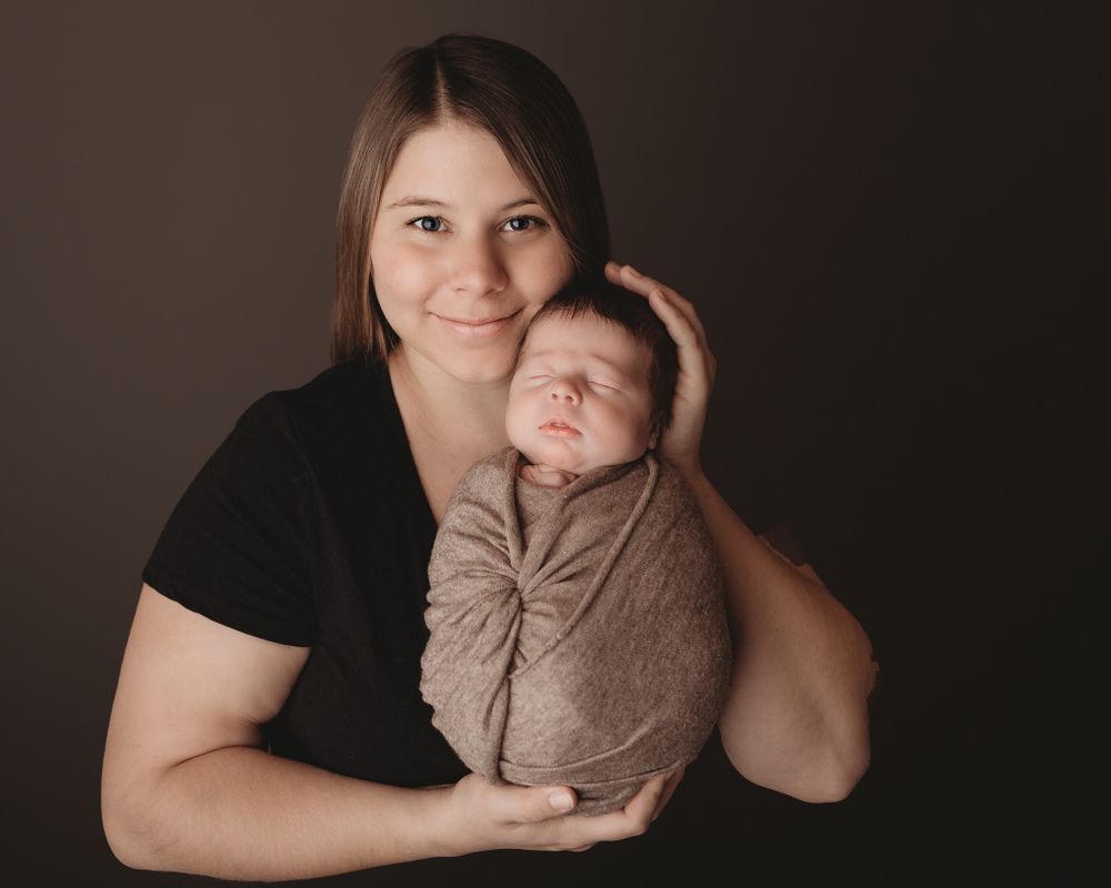 Professional newborn photo with mom