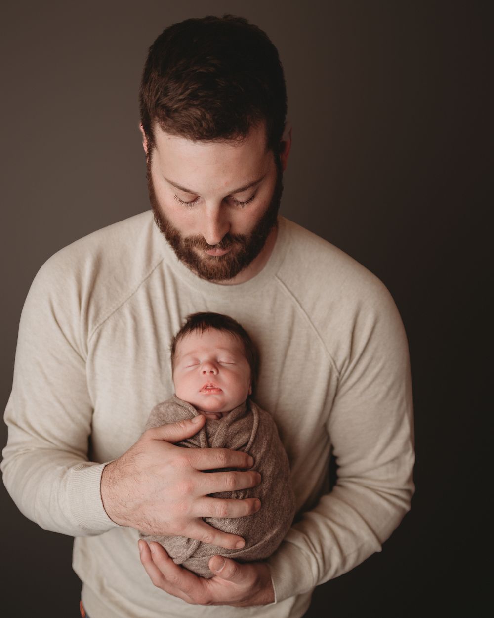 Professional newborn photo with dad