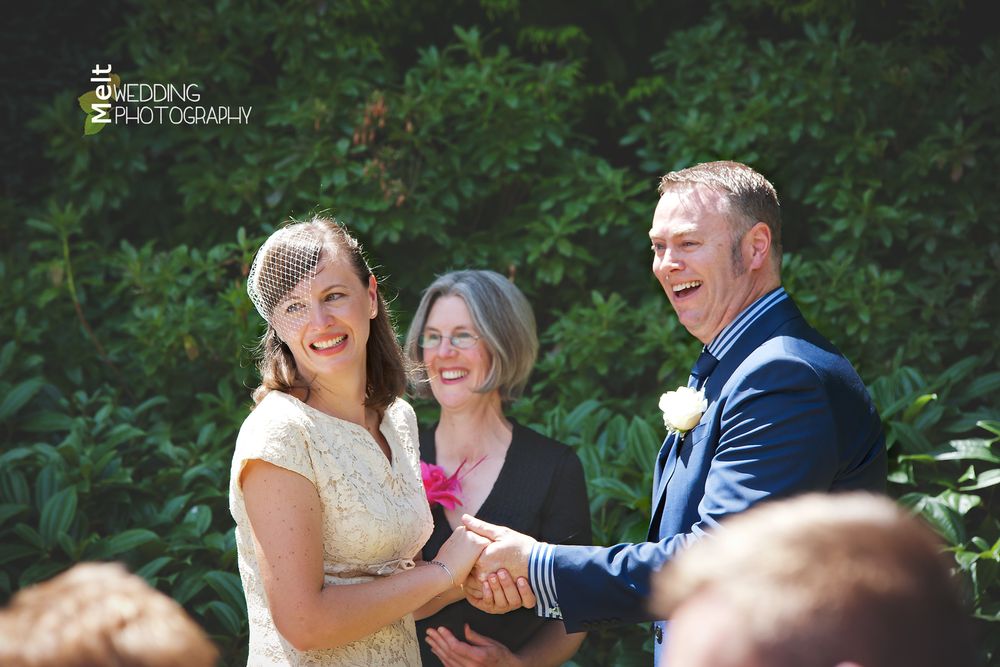 Sarah & Thornton looking at their loved ones attending their wedding day