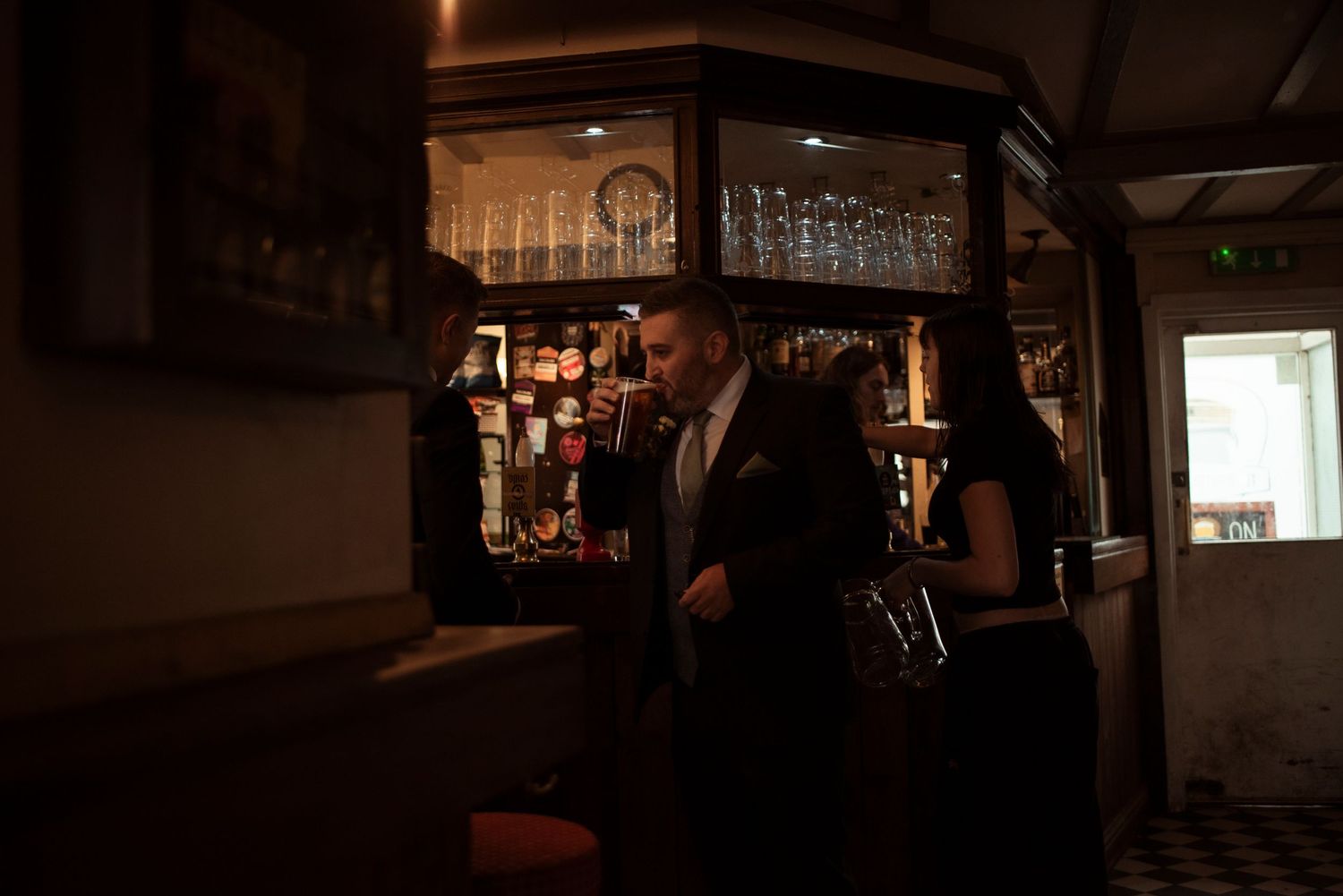 groom having a pint in a pub, sheffield wedding