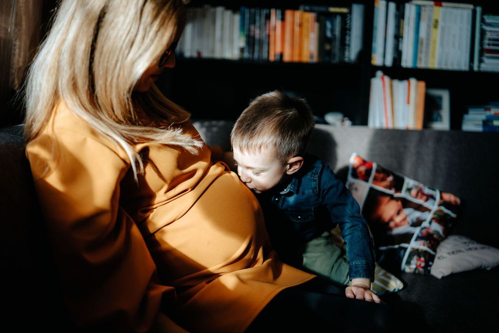 Cozy indoor scene with yellow sweater and natural window lighting.