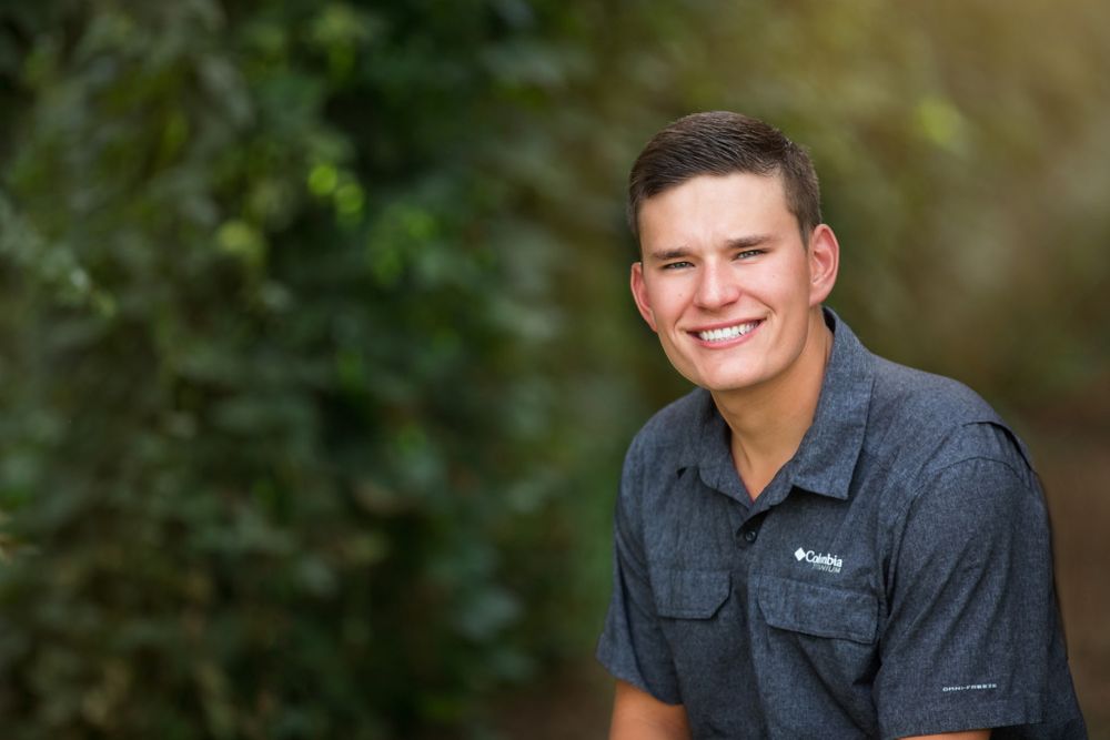 outdoor male headshot in natural environment