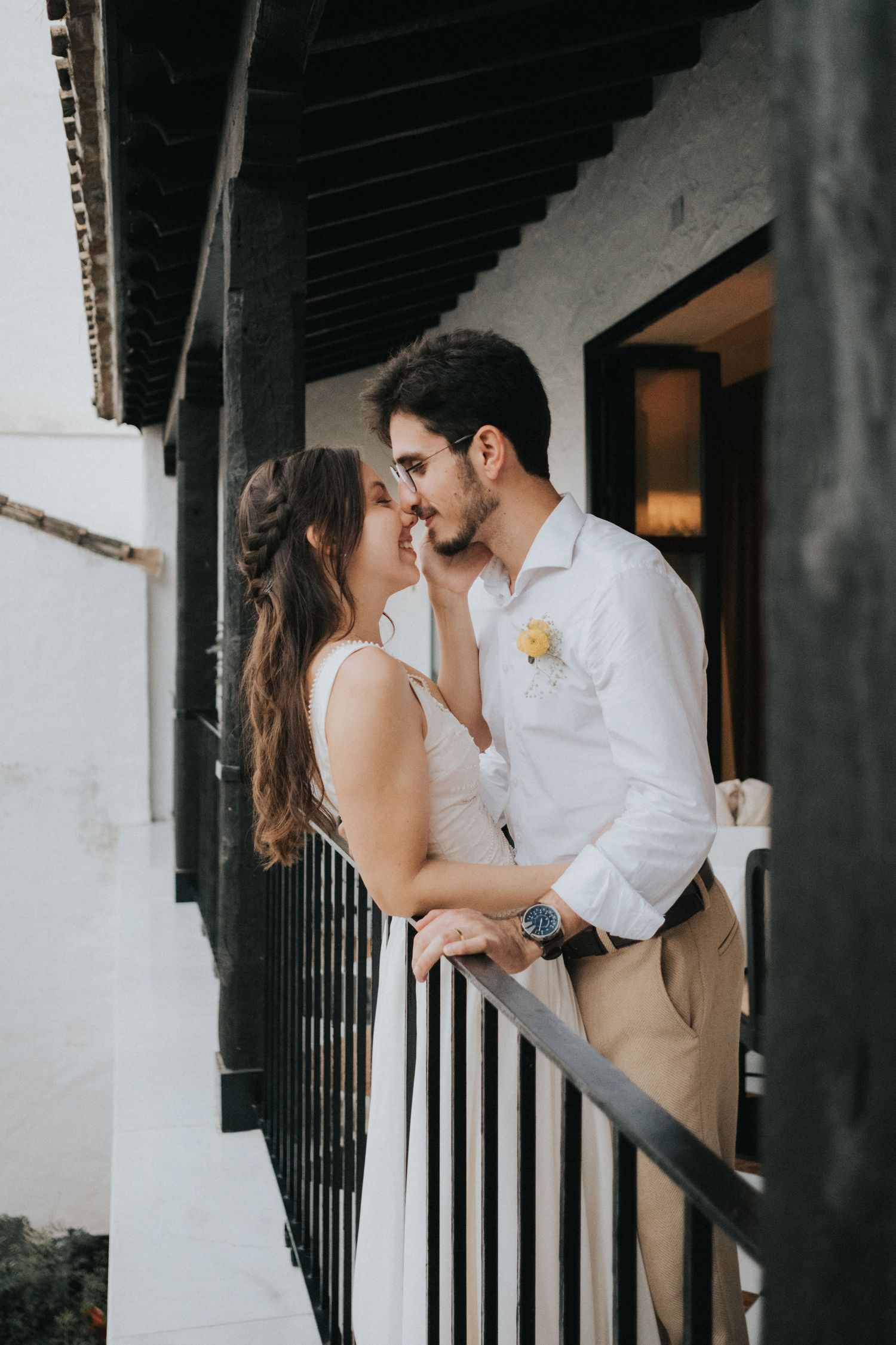 international wedding, couple holding each other