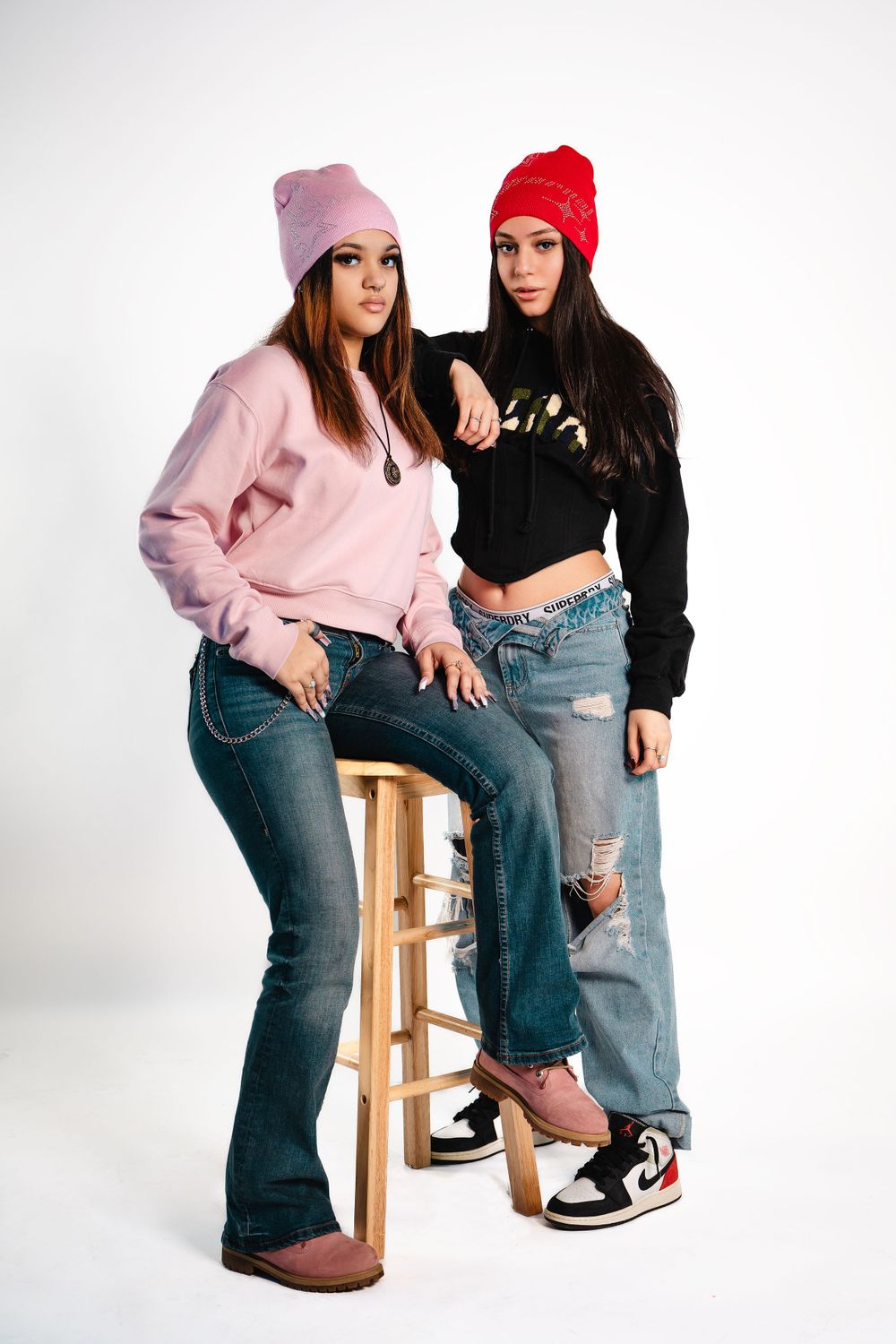Studio portrait featuring a mix of beanie colors — creative fashion lighting by Timoy B Photography.