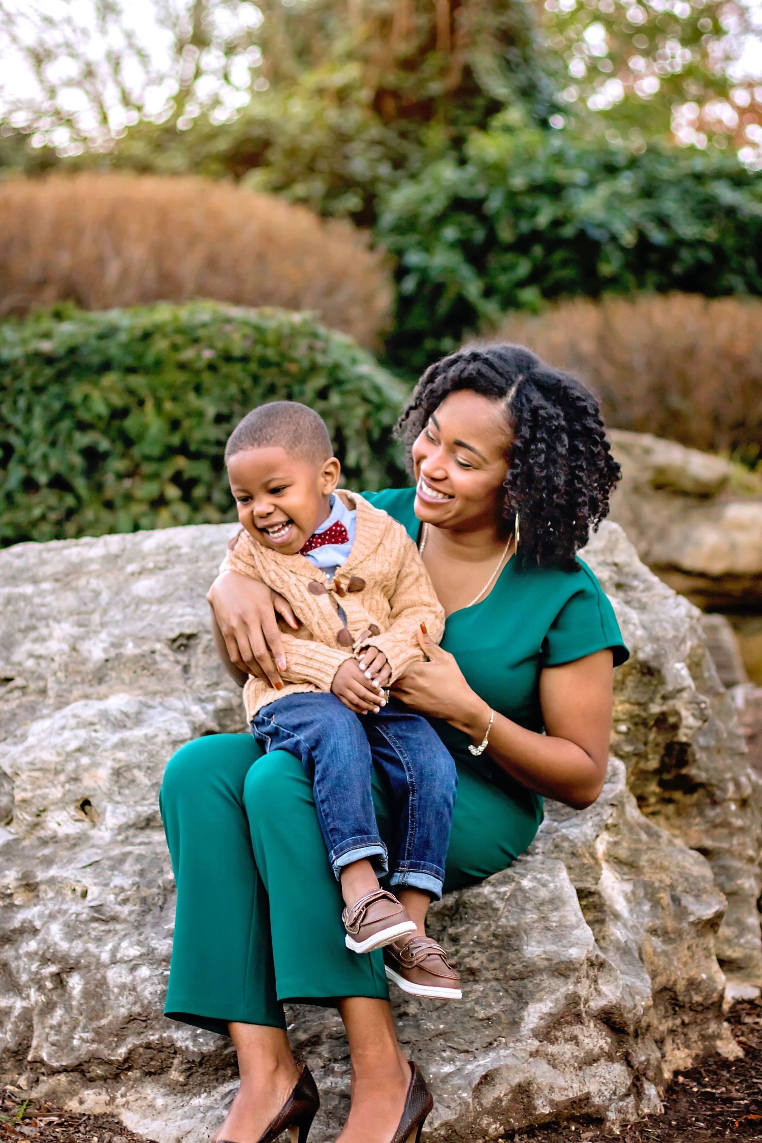louisville family photography toddler boy fall papa johns park waterfall orange leaves mom and son rock