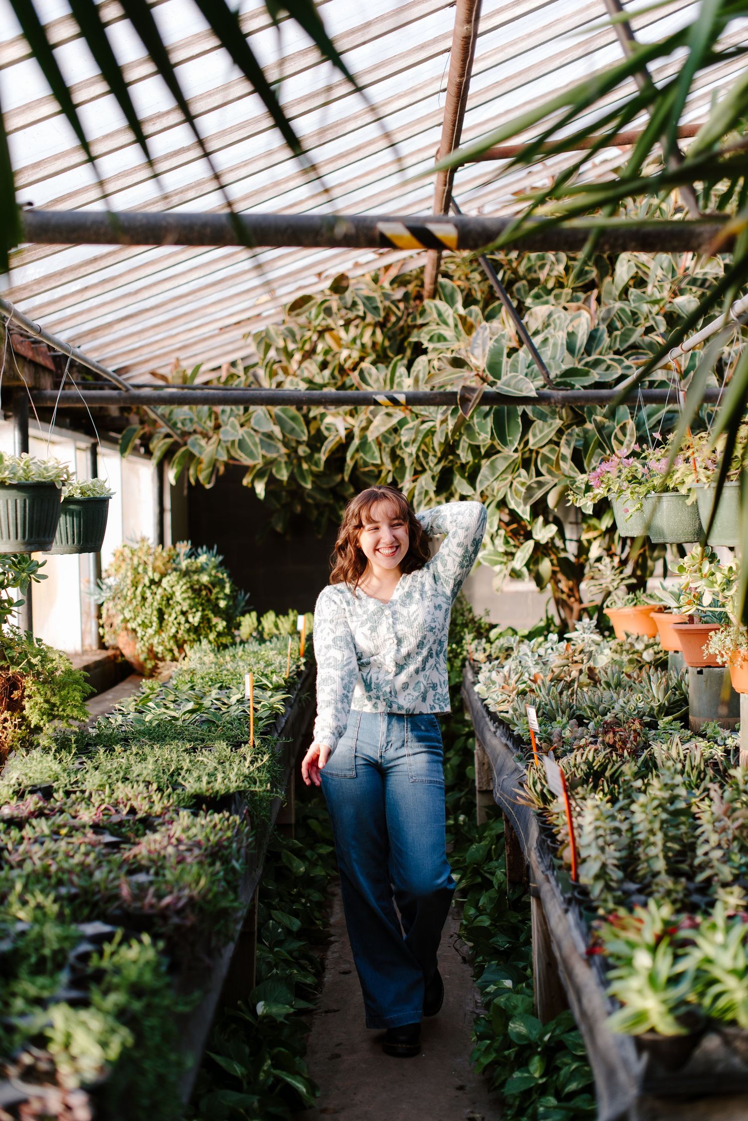 High school senior pictures Plant Kingdom greenhouse Wichita, KS