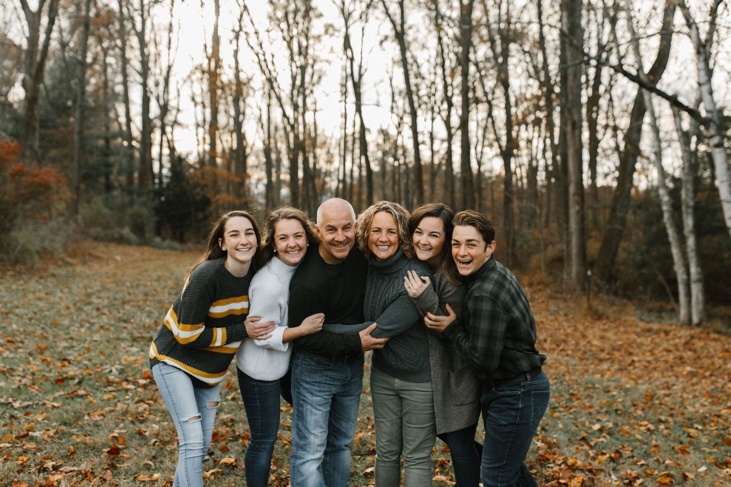 Jen owner family in her meadow during the Fall