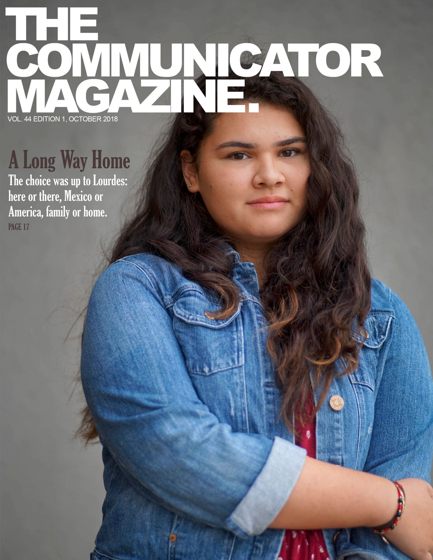 Magazine cover showing someone in denim jacket against gray background with title The Communicator Magazine.