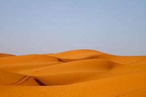The red sands of Sahara Desert near Merzouga Morocco Africa