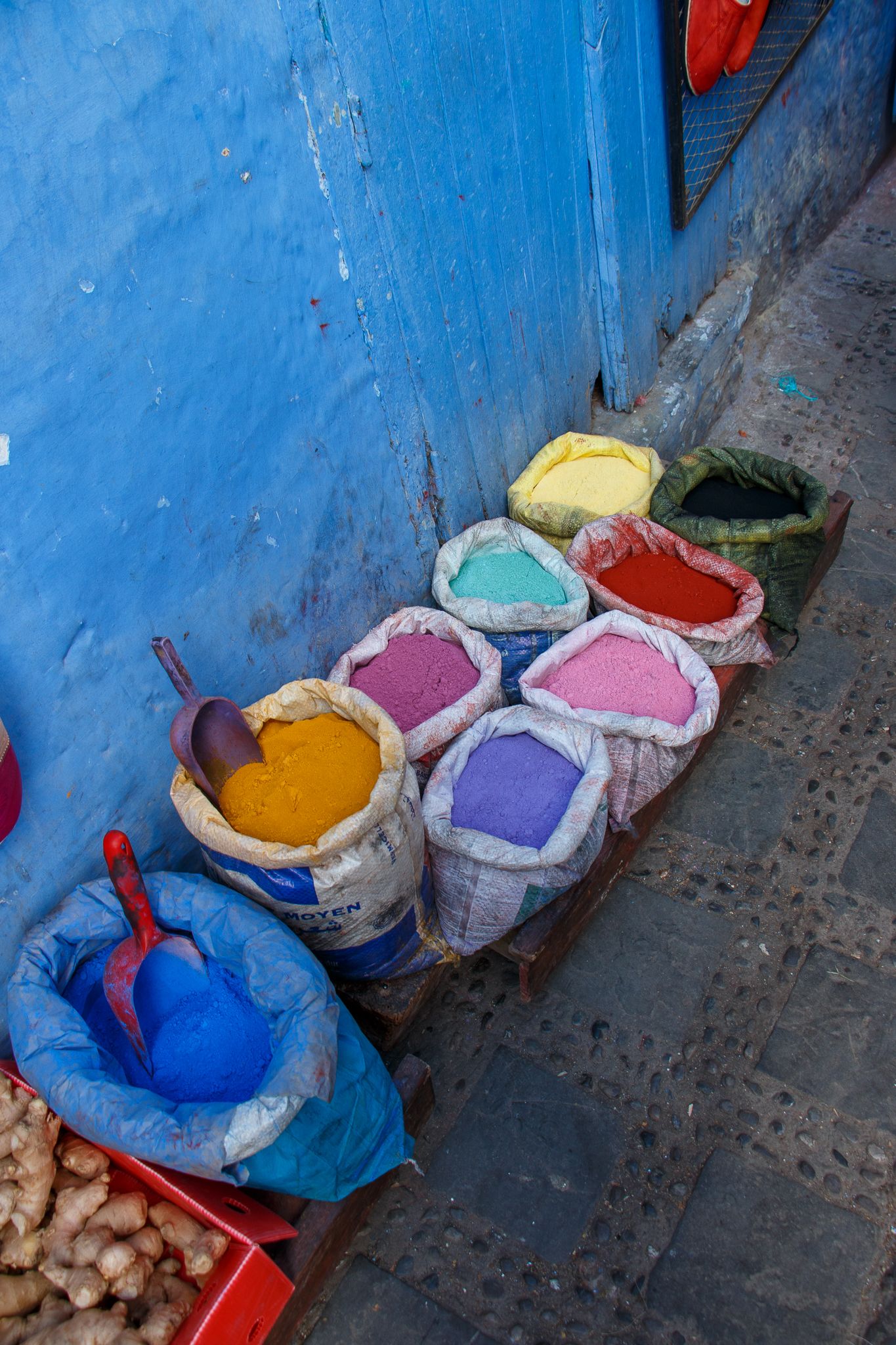Bags of colourful powdered pigments in Chefchaouen Morocco