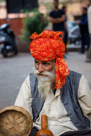 snake charmer on the streets of Old Delhi India