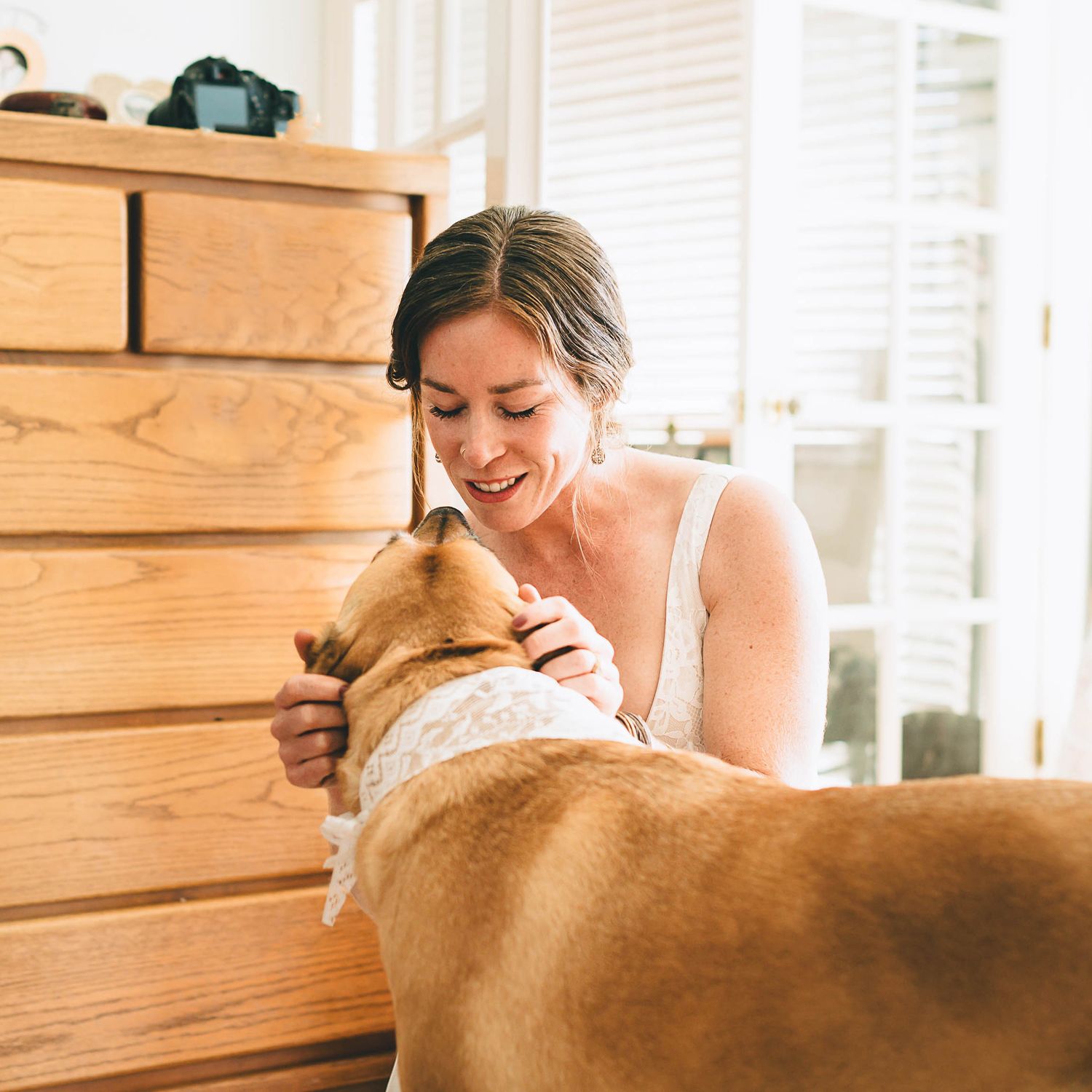 bride and her maid of honor dog