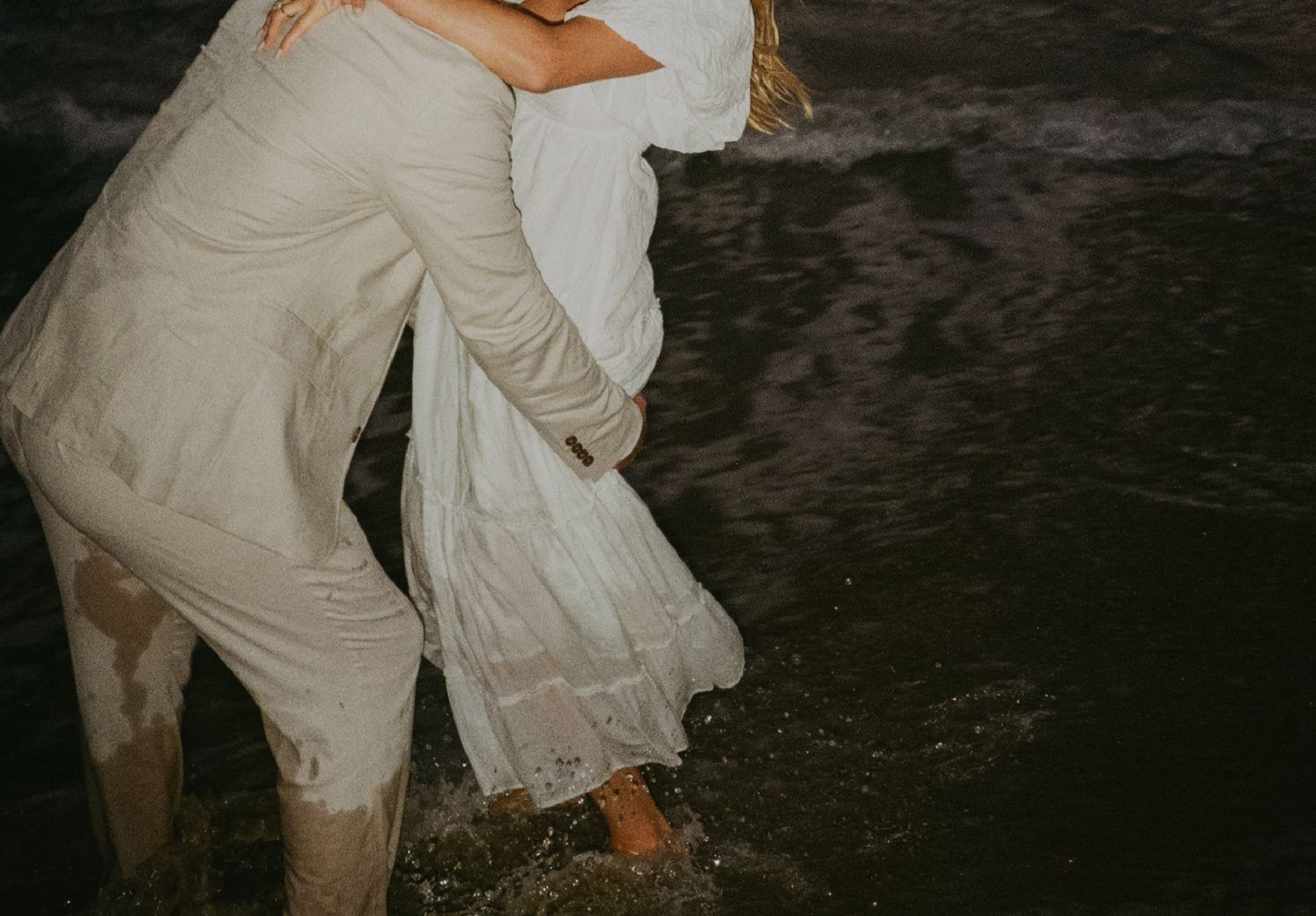 Newport beach sunset couple's engagement shoot on 35mm film camera during blue hour