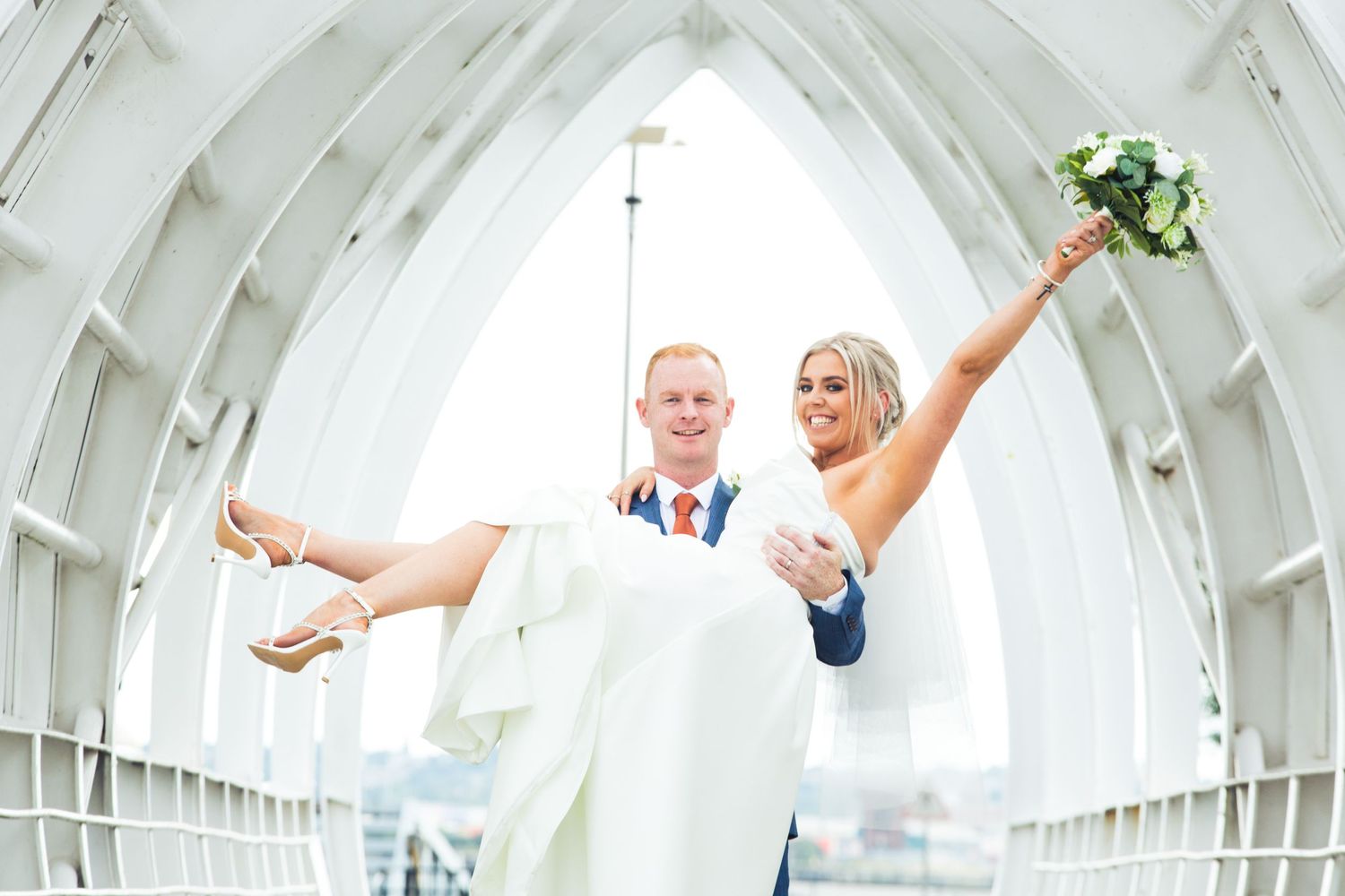 Joyful bride and groom, wedding at malmaison hotel Liverpool