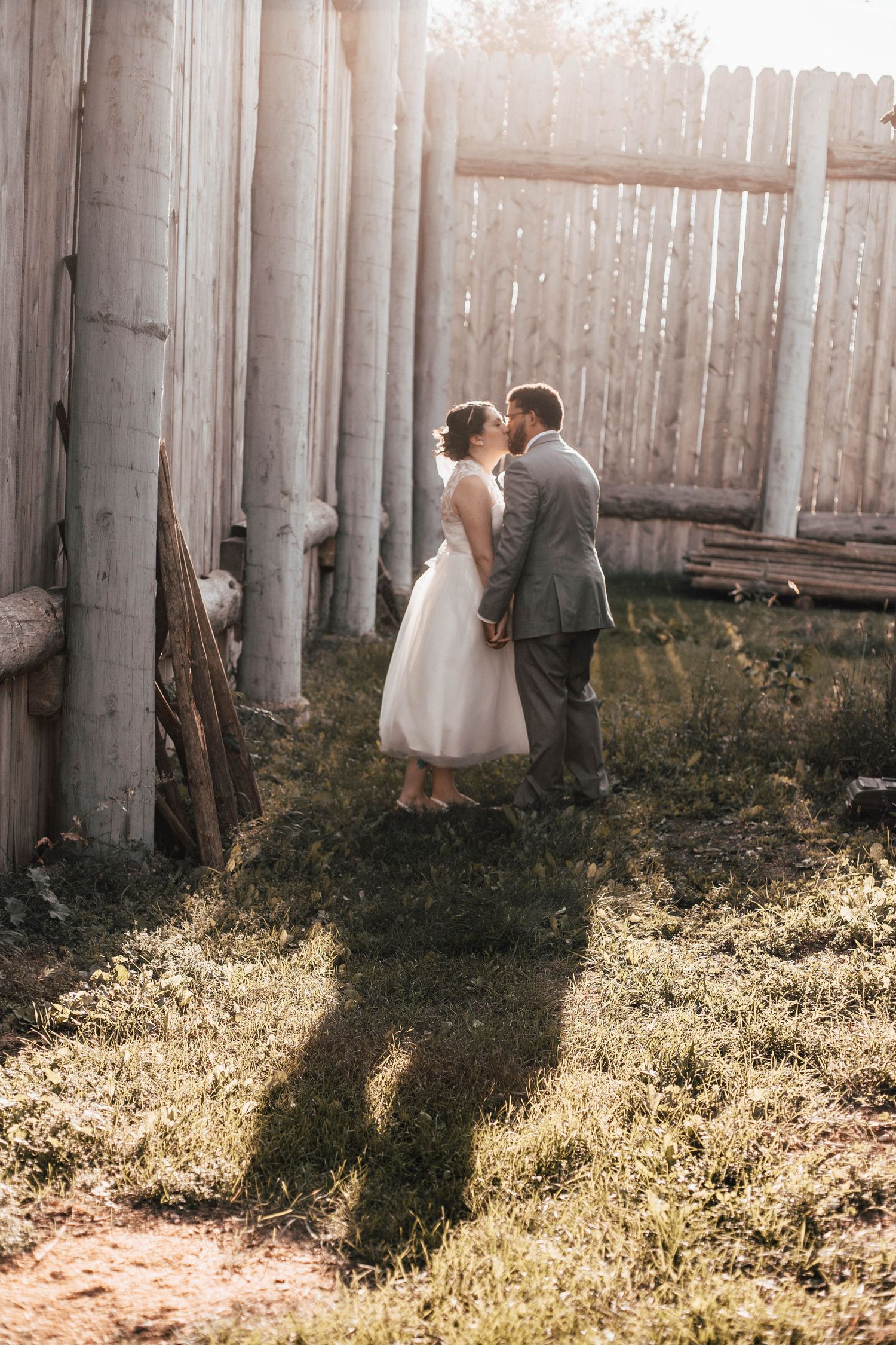 Wedding couple posed kissing