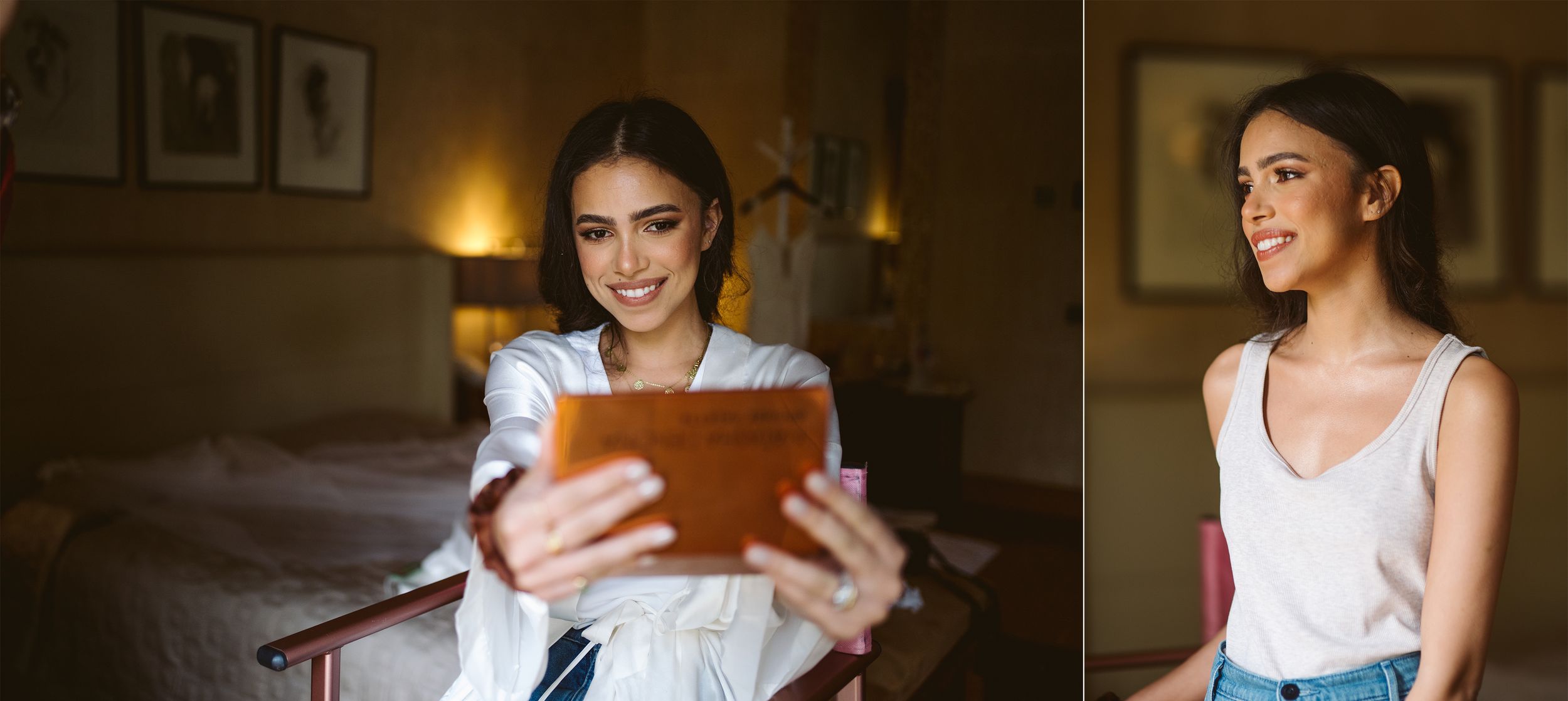Person in casual attire looking at tablet device in warm indoor lighting.
