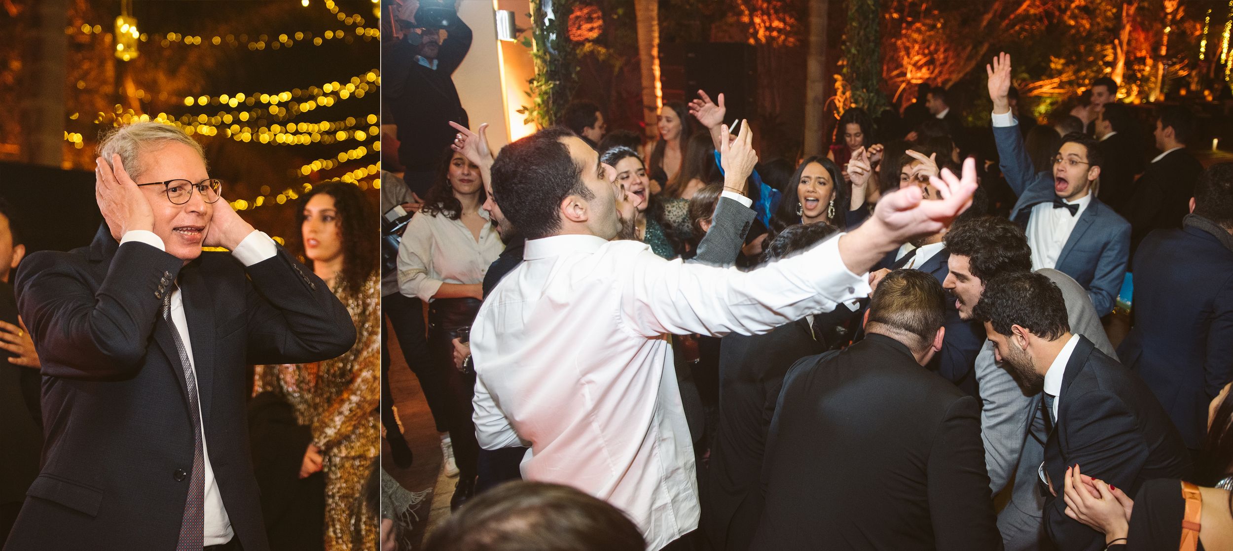 Energetic crowd dancing with arms raised at a nighttime celebration.