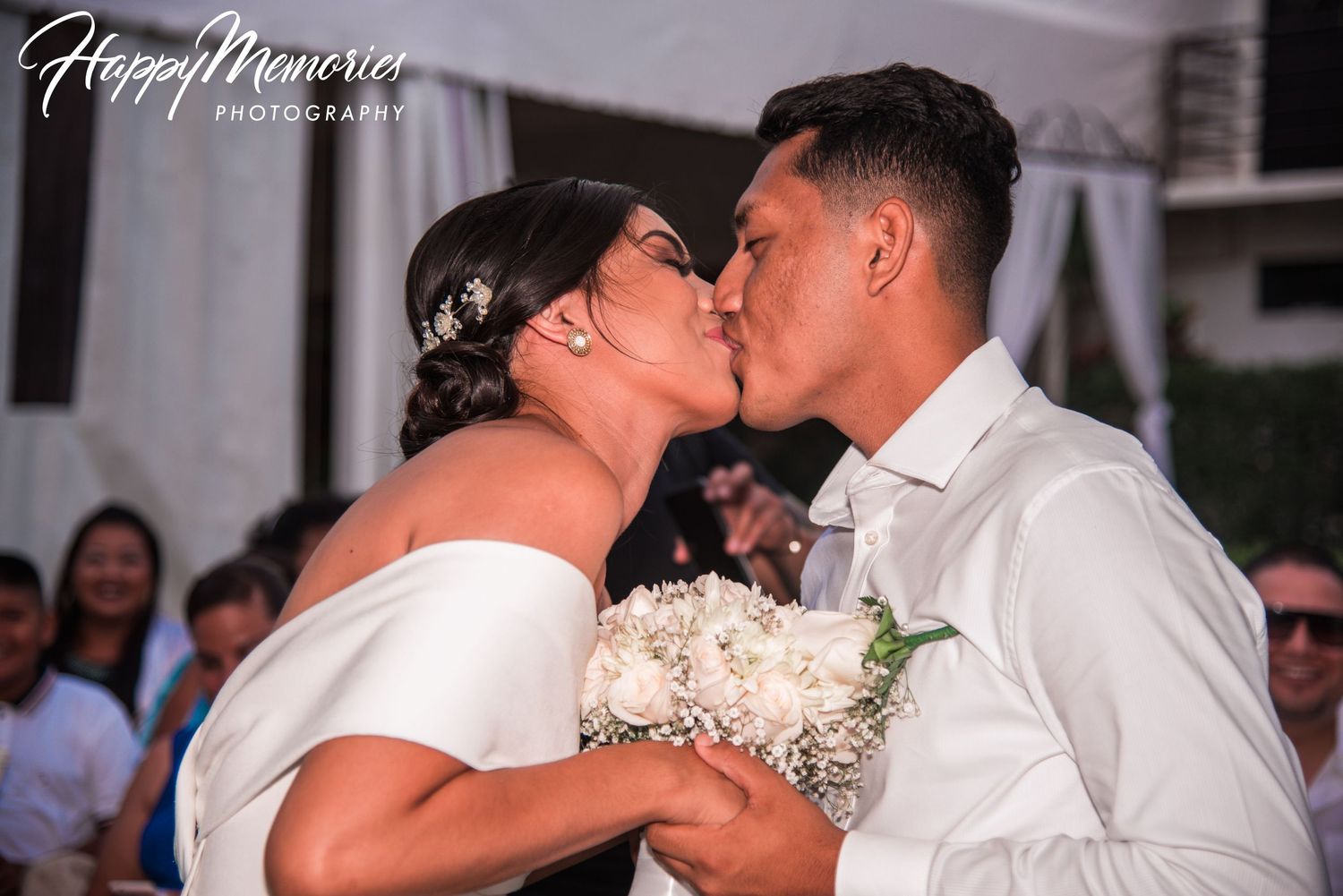 Romantic first dance moment at an evening wedding reception.