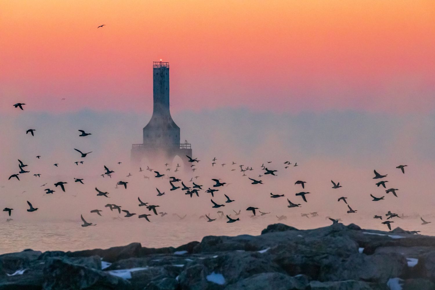 Port Washington, Wisconsin lighthouse at sunrise in winter with waterfowl print for sale