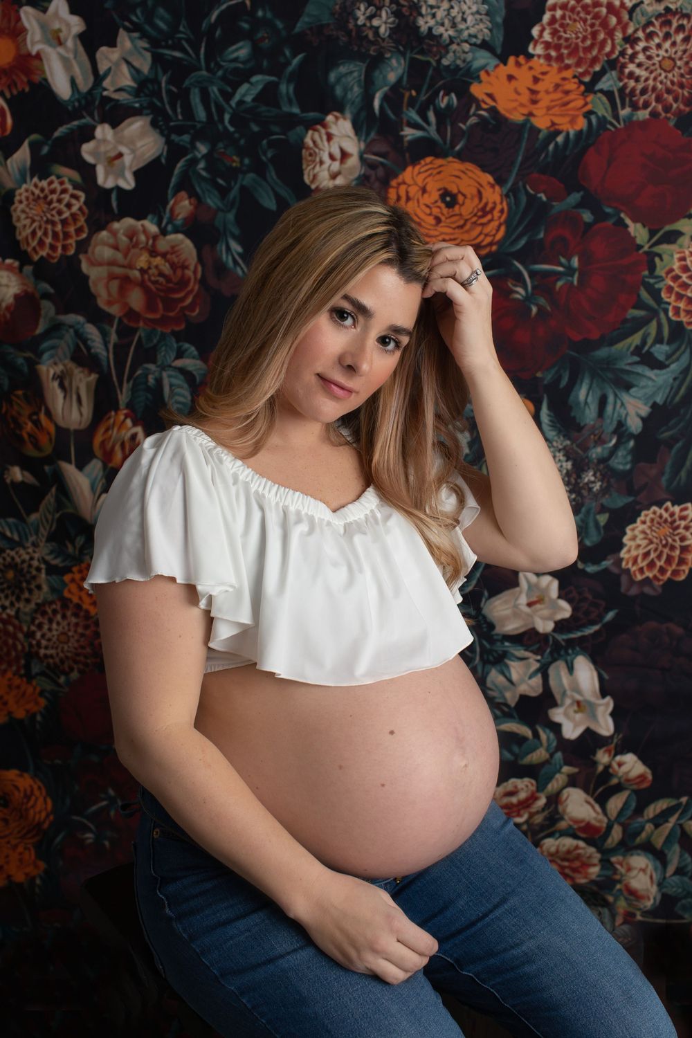 beautiful pregnant woman posing for maternity photography in barrington, ri
