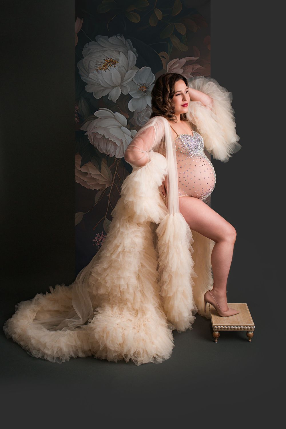 beautiful pregnant woman posing for pregnancy photo in fur coat in barrington, ri