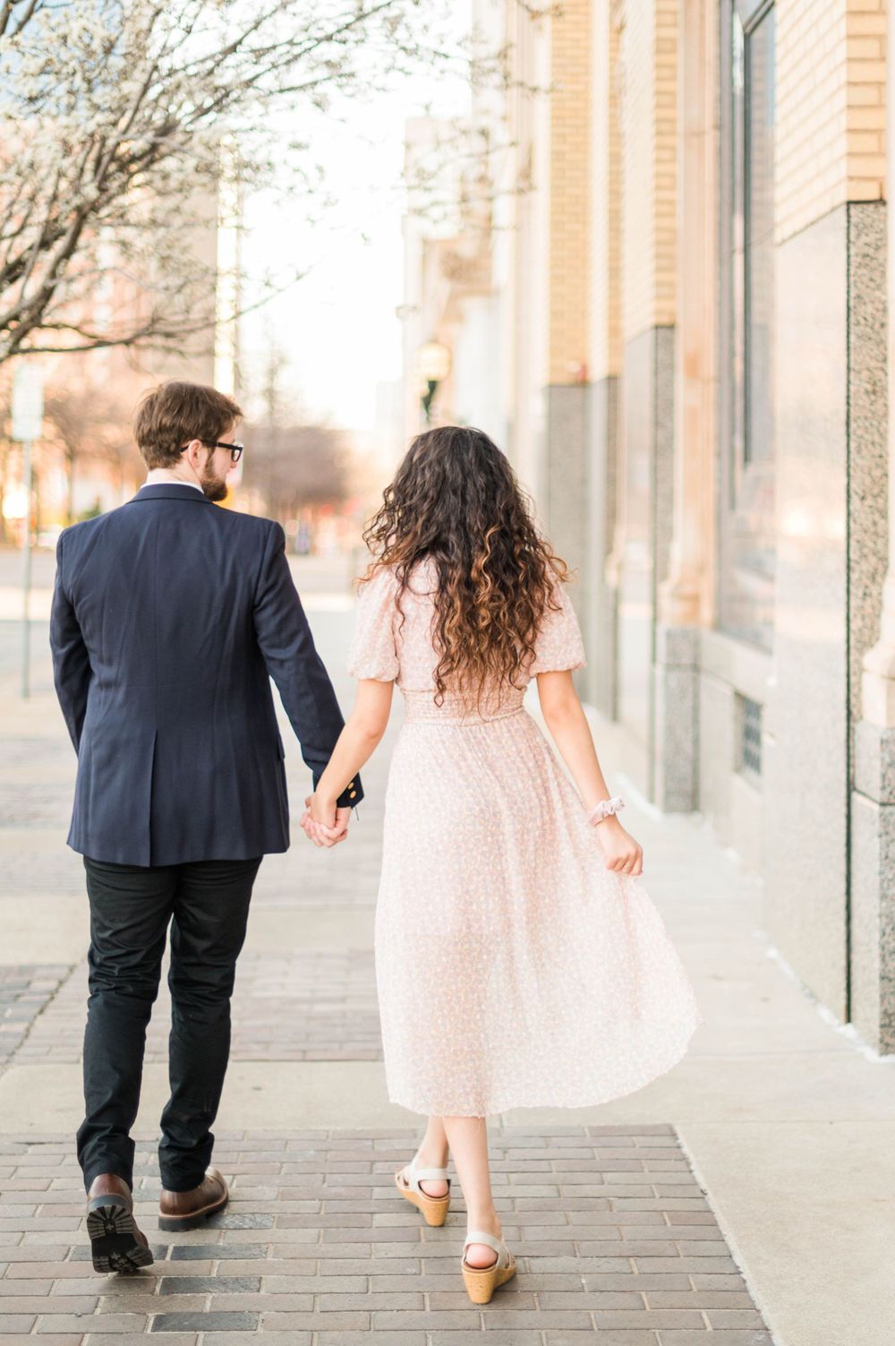 Spring time engagement session for Catholic couple at Myriad Gardens and Downtown Oklahoma City, OK.