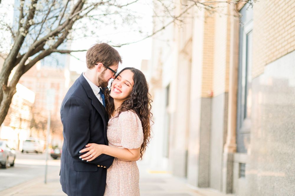 Spring time engagement session for Catholic couple at Myriad Gardens and Downtown Oklahoma City, OK.