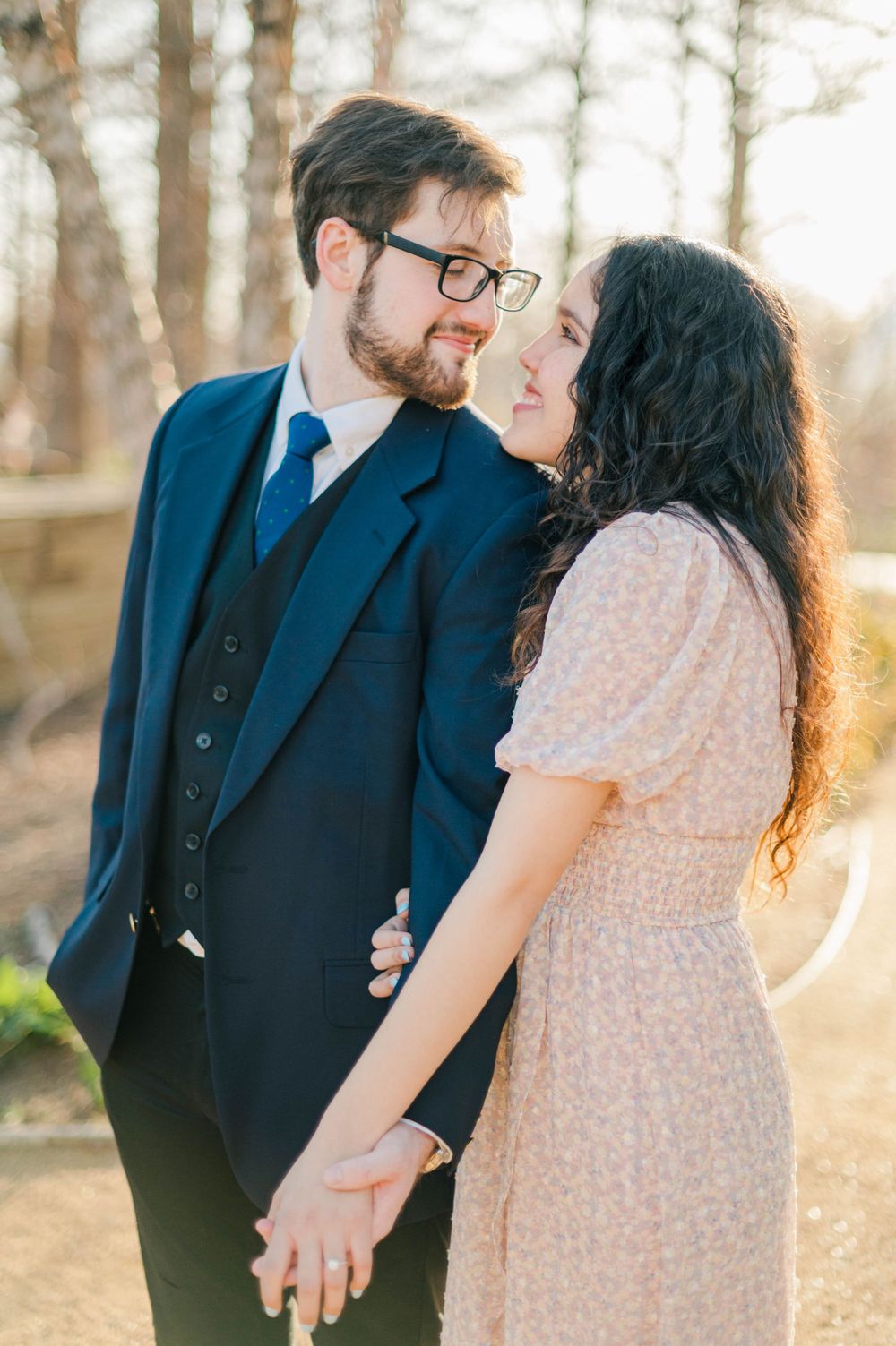 Spring time engagement session for Catholic couple at Myriad Gardens and Downtown Oklahoma City, OK.