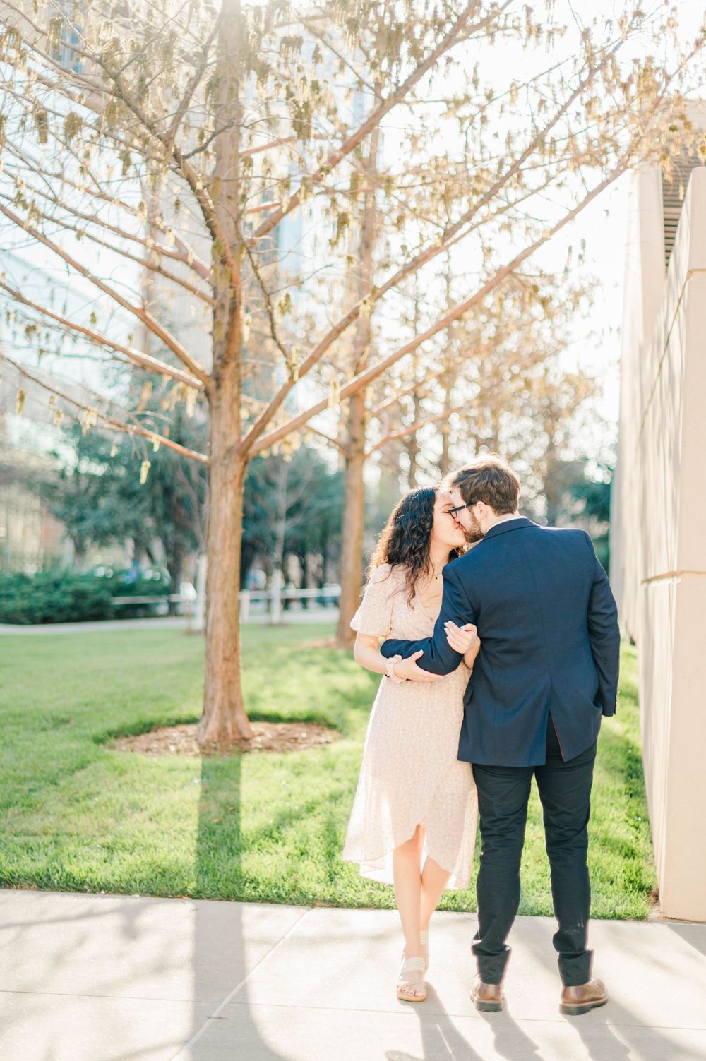 Spring time engagement session for Catholic couple at Myriad Gardens and Downtown Oklahoma City, OK.