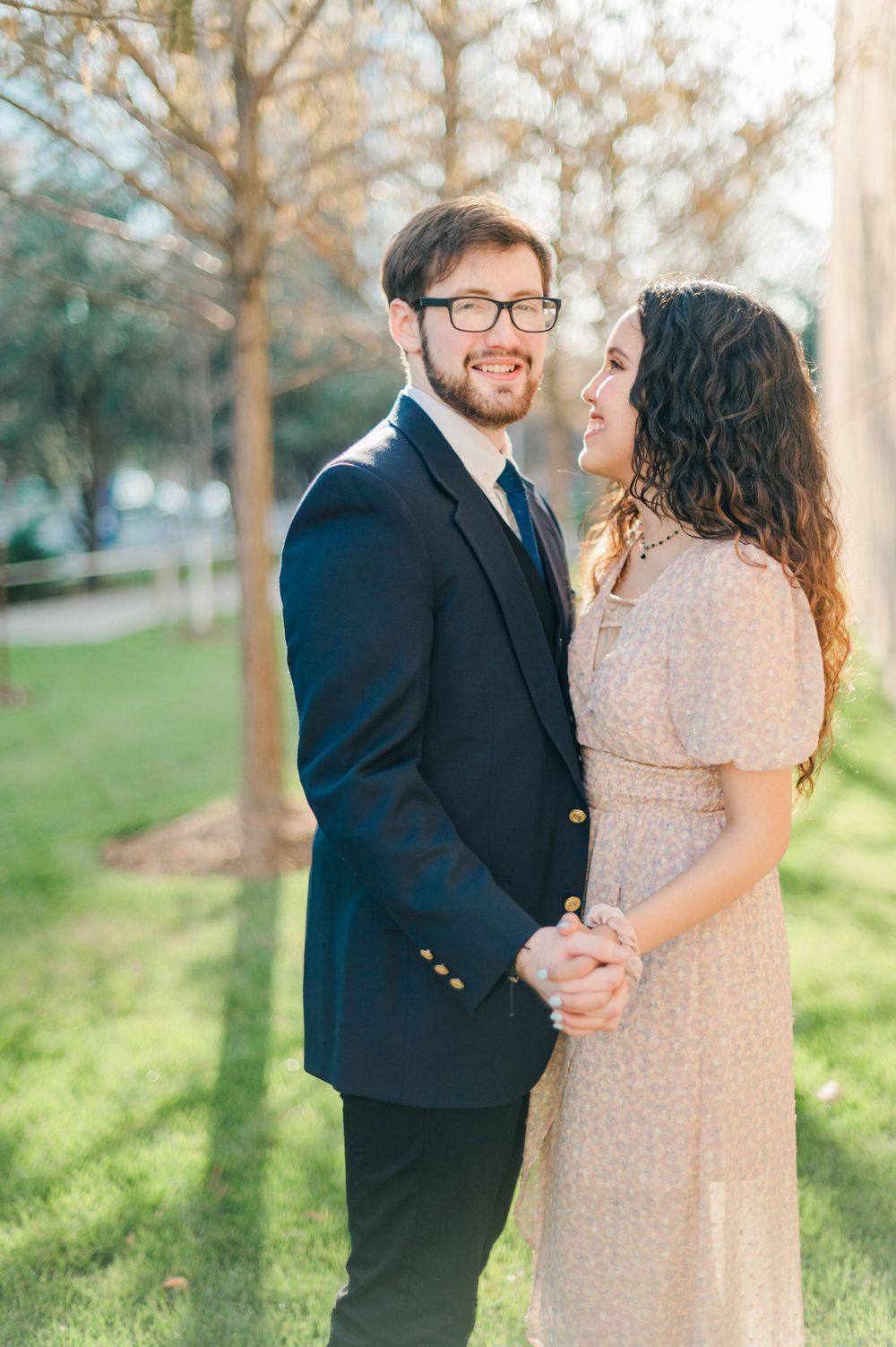 Spring time engagement session for Catholic couple at Myriad Gardens and Downtown Oklahoma City, OK.