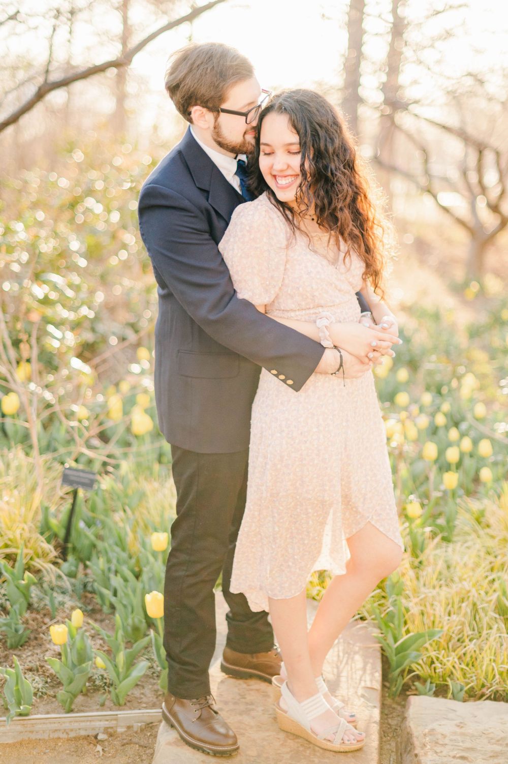 Spring time engagement session for Catholic couple at Myriad Gardens and Downtown Oklahoma City, OK.