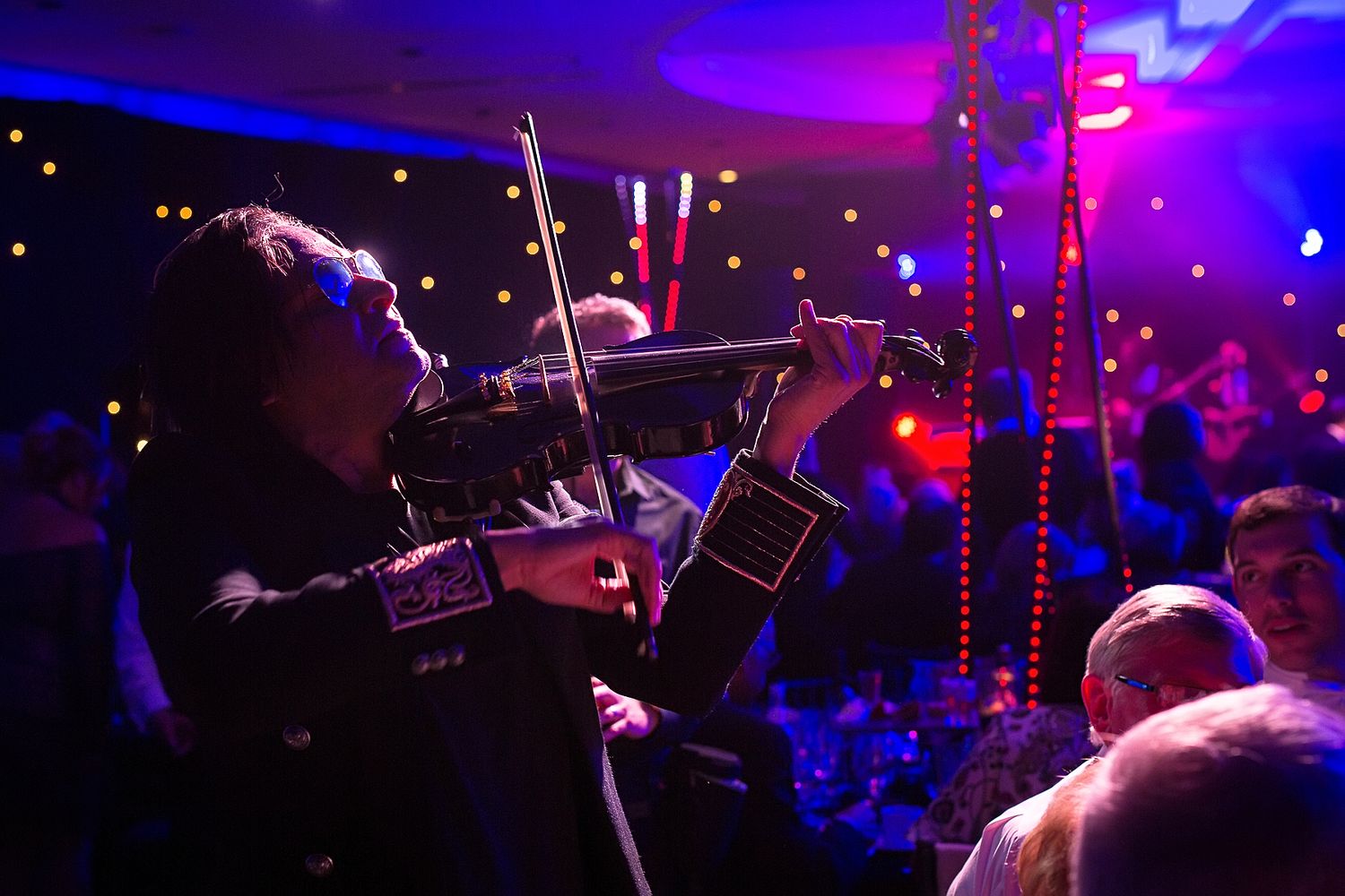 Man playing the violin at a Manchester event photography Charity Ball