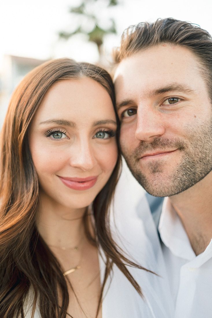 Close up portrait of a couple in warm sunlight.